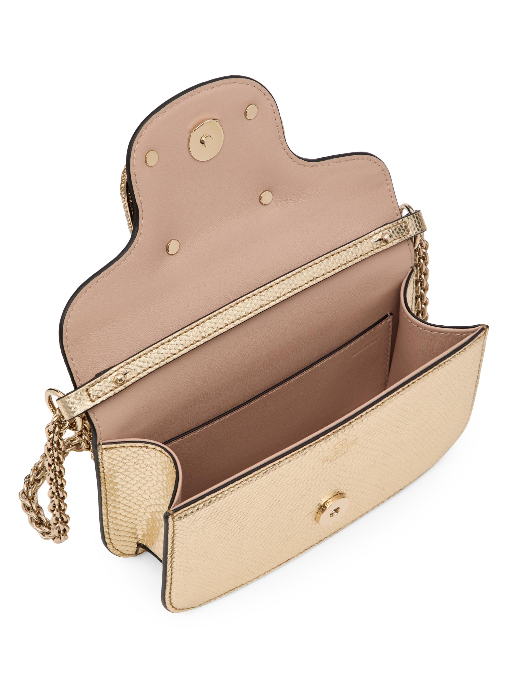 Shop Valentino Garavani Locò Small Shoulder Bag in Metallic Karung 