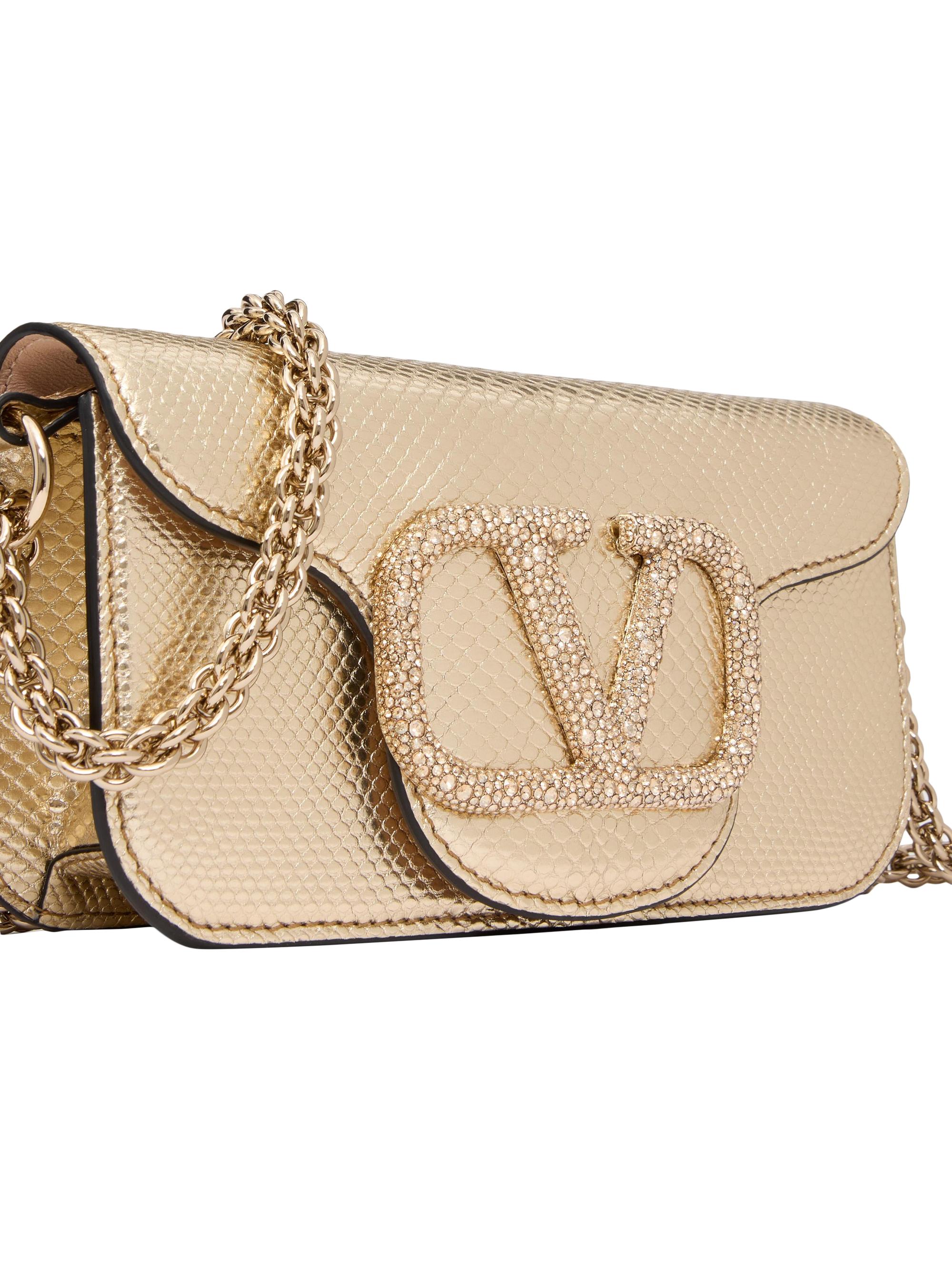 Shop Valentino Garavani Locò Small Shoulder Bag in Metallic Karung 
