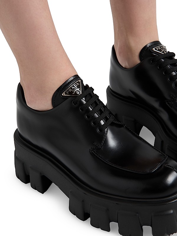 Shop Prada Monolith Brushed Leather Lace-Up Shoes | Saks Shop Prada Monolith Brushed Leather Lace-Up Shoes | Saks