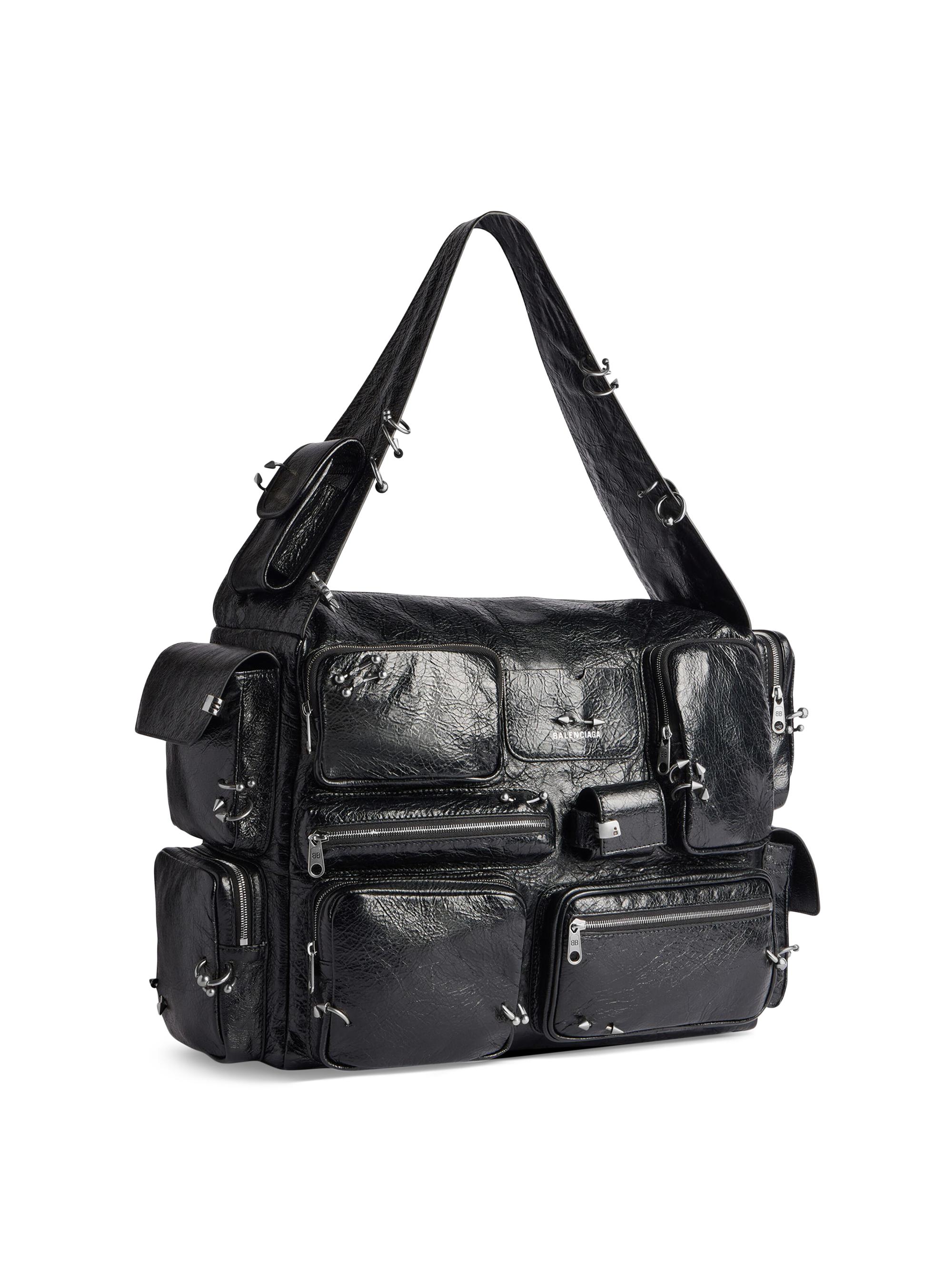 バレンシアガ 24AW SUPERBUSY SLING BAG レザーバッグ Balenciaga Superbusy Large Sling Bag with Piercings | Saks Fifth