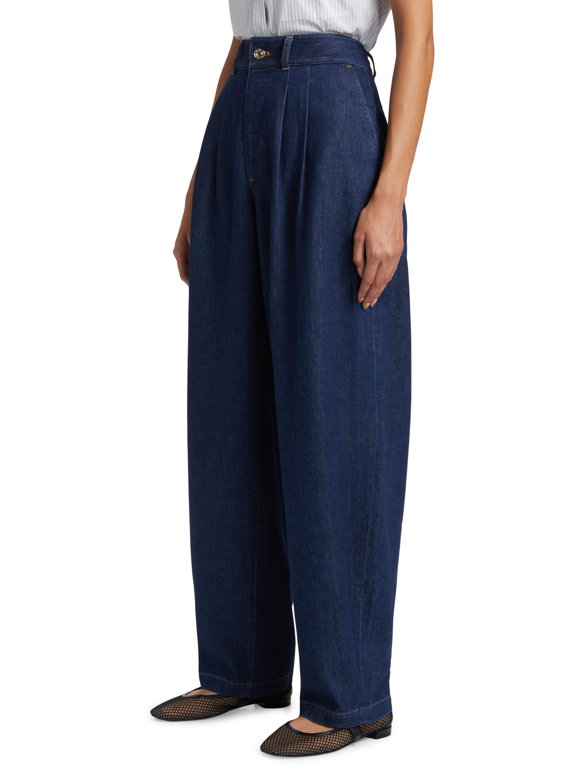Frame The Tapered Pleated Denim Trousers | Saks Fifth Avenue