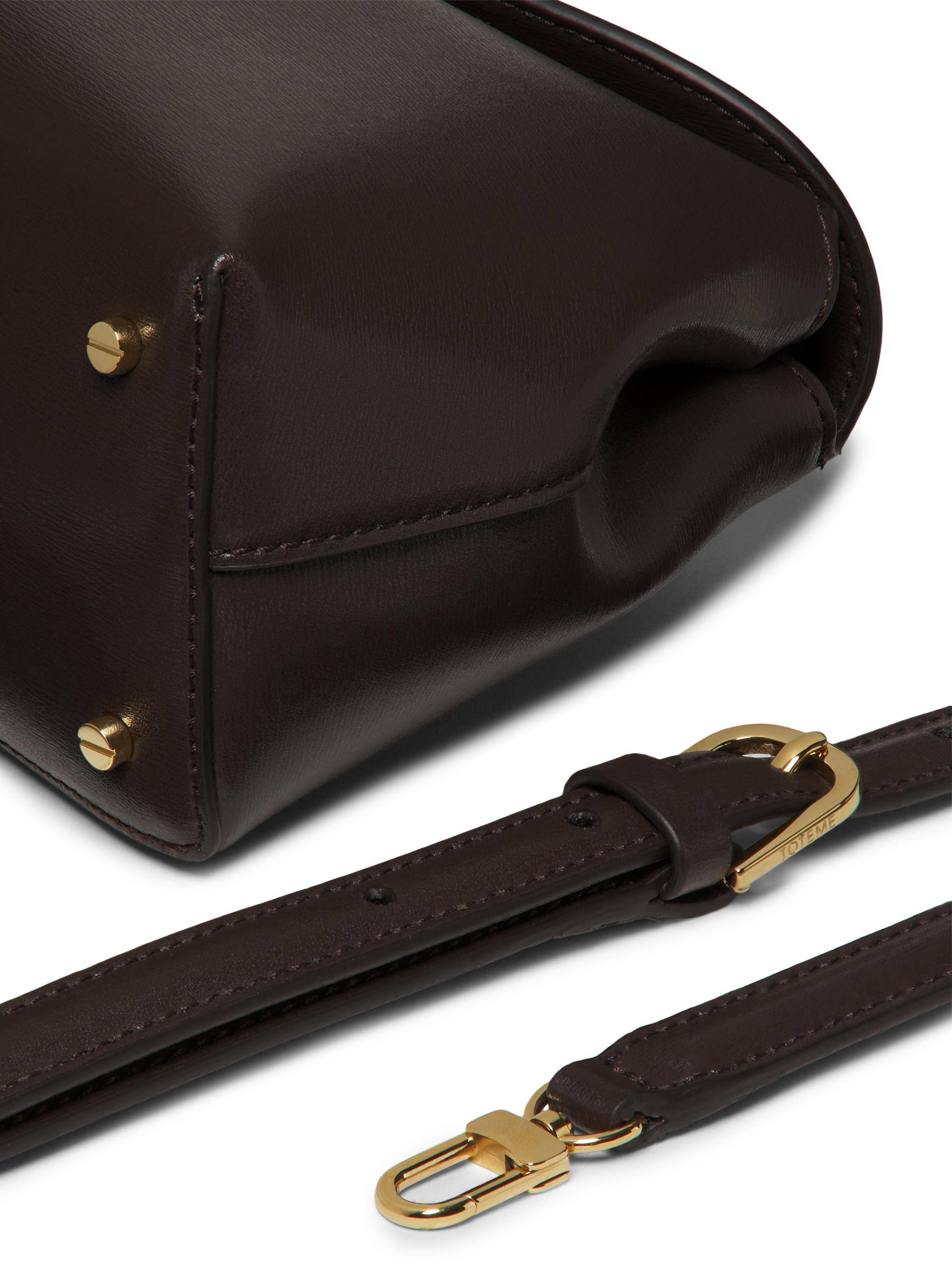 Toteme T-Lock Convertible Leather Clutch | Saks Fifth Avenue