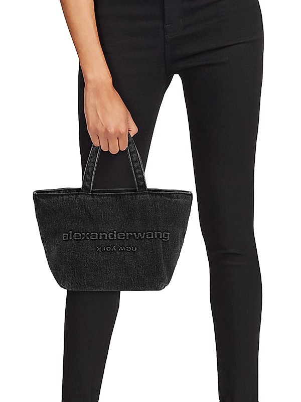 Shop Alexander Wang Small Punch Logo Denim Tote Bag | Saks Shop Alexander Wang Small Punch Logo Denim Tote Bag | Saks