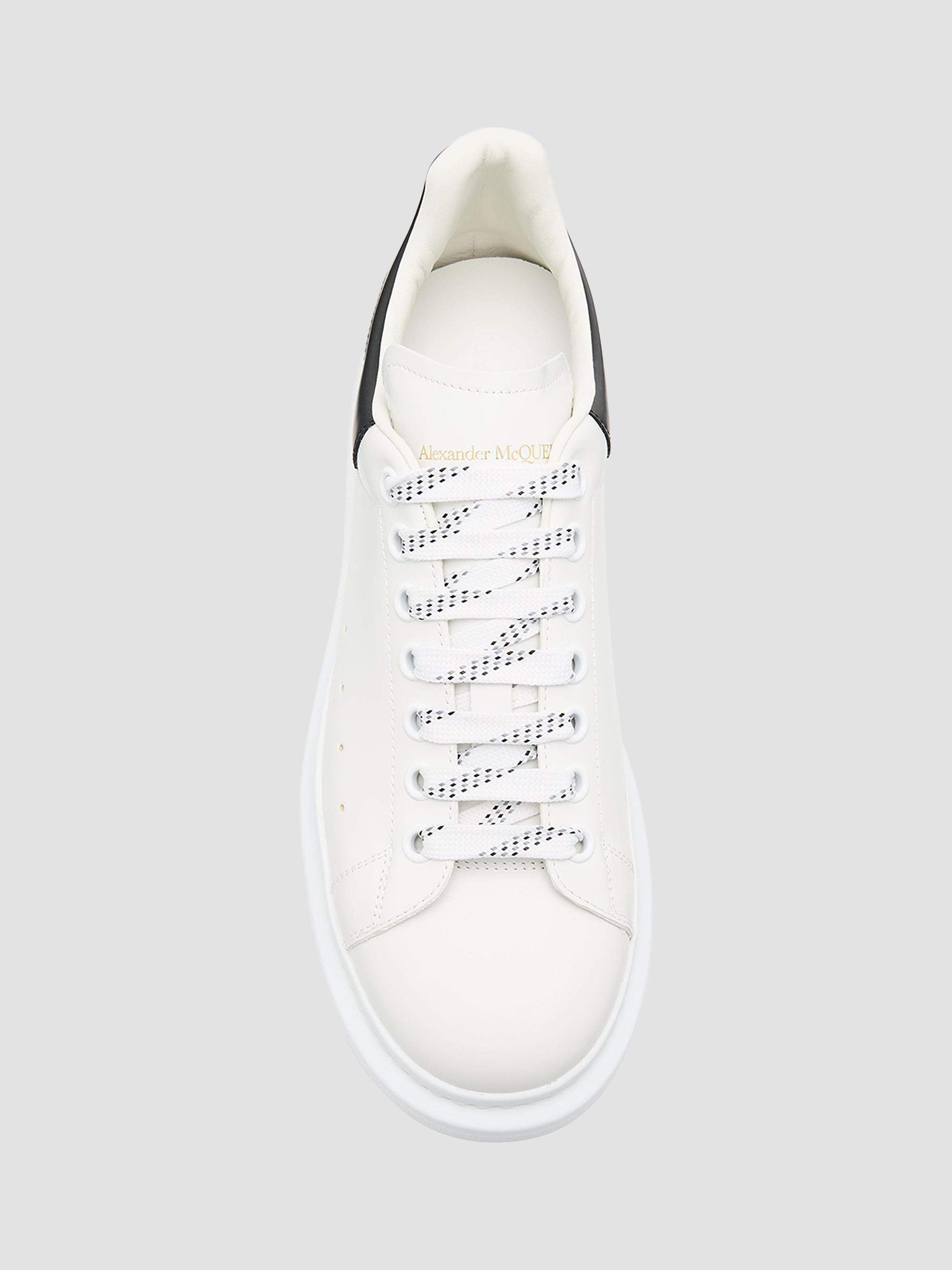 McQueen Oversized Leather Low-Top Sneakers | Saks Fifth Avenue