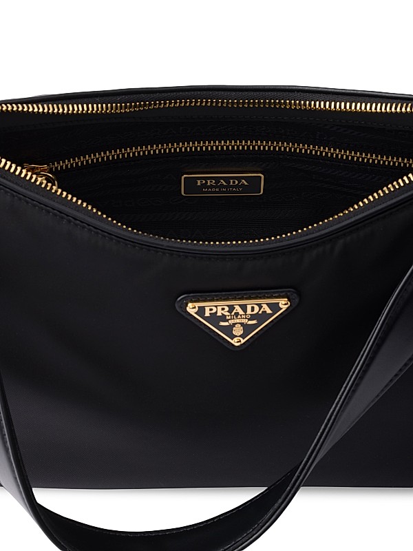 Shop Prada Large Re-Nylon and Leather Shoulder Bag | Saks Shop Prada Large Re-Nylon and Leather Shoulder Bag | Saks