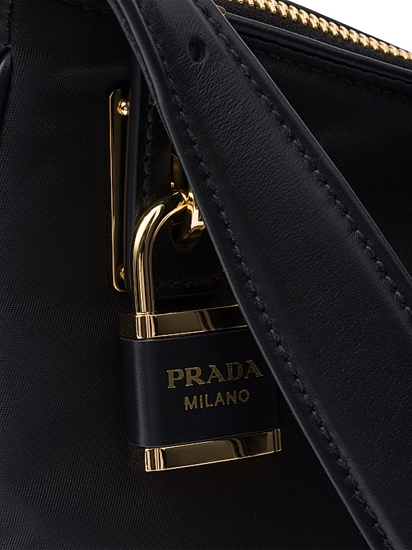Shop Prada Large Re-Nylon and Leather Shoulder Bag | Saks Shop Prada Large Re-Nylon and Leather Shoulder Bag | Saks