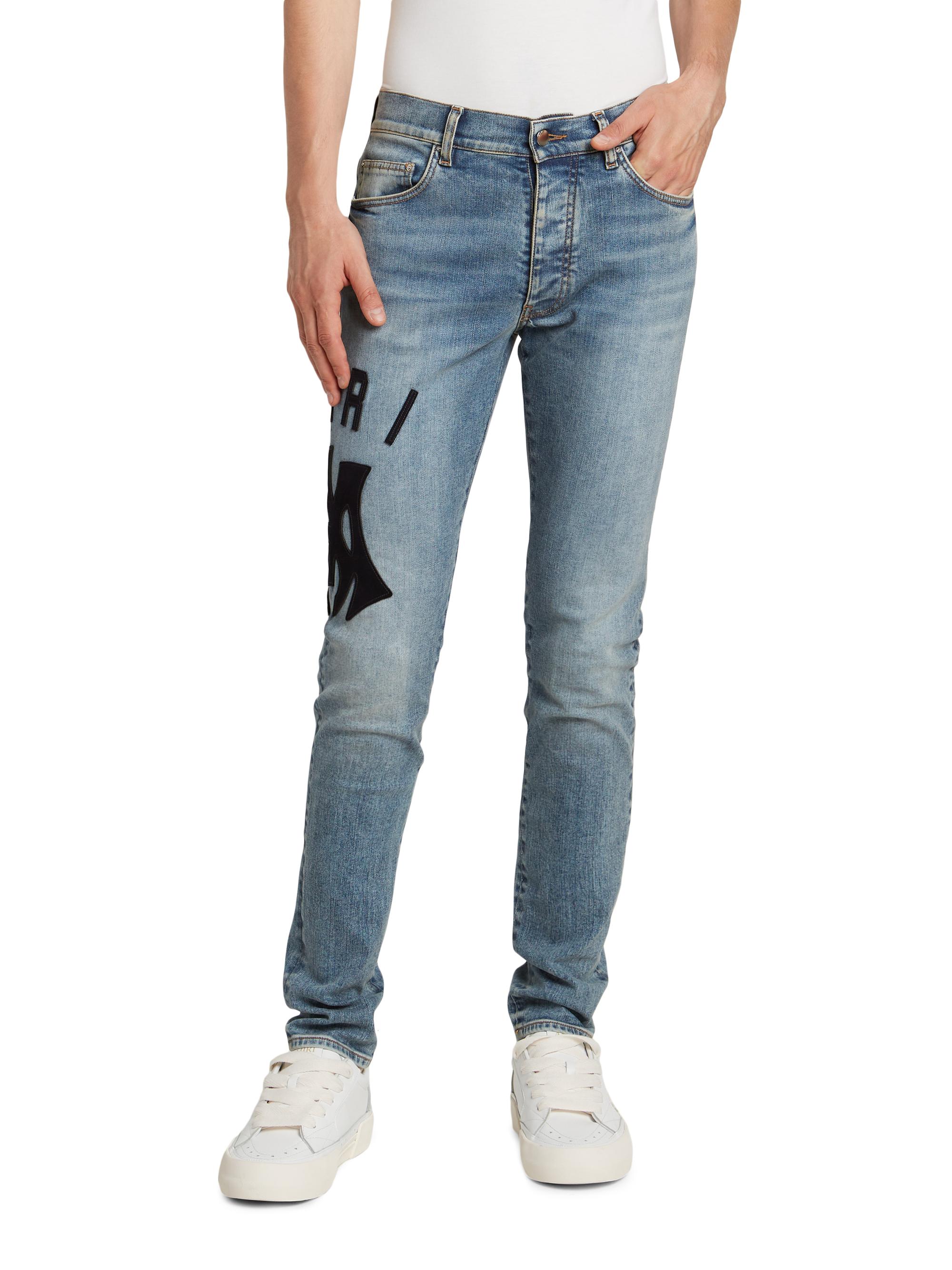 Amiri Suede Appliqué Logo Skinny Jeans | Saks Fifth Avenue