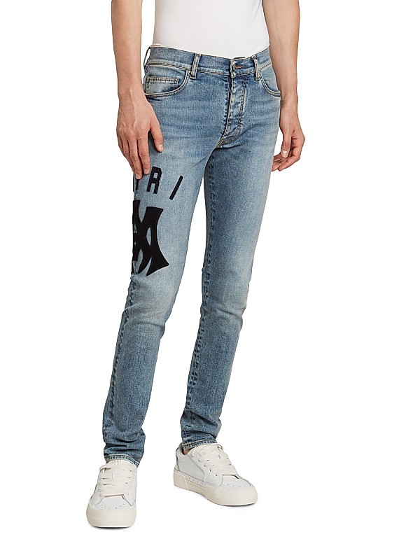 Shop Amiri Suede Appliqué Logo Skinny Jeans | Saks Fifth Avenue Shop Amiri Suede Appliqué Logo Skinny Jeans | Saks Fifth Avenue