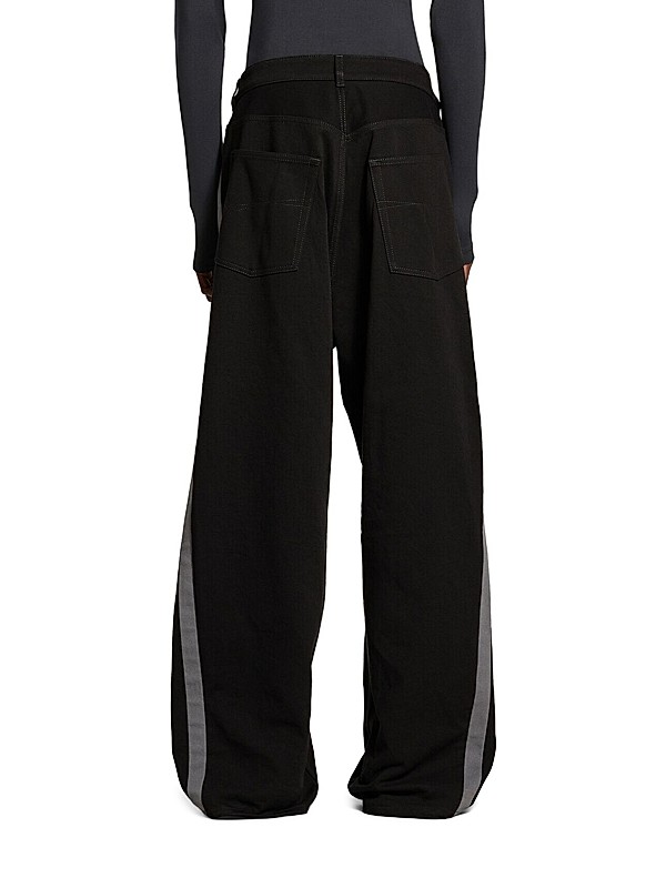 Shop Balenciaga Under Armour Tracksuit Denim Pants | Saks Shop Balenciaga Under Armour Tracksuit Denim Pants | Saks