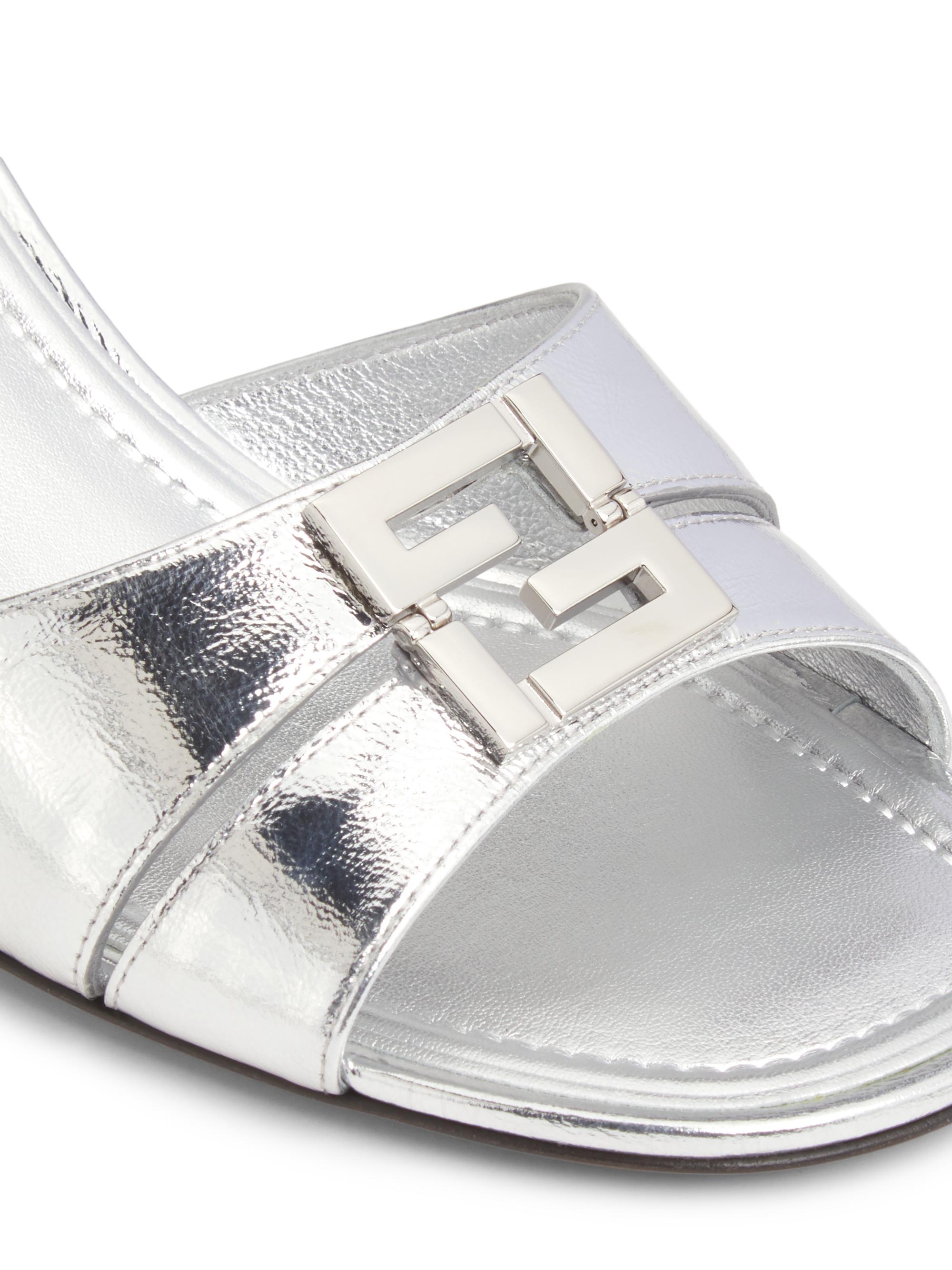 正規品【新品電池】FENDI 760L/人気モデル 美品 ホワイトシェル 人気 Fendi Fold 55MM Logo Metallic Leather Sandals | Saks Fifth