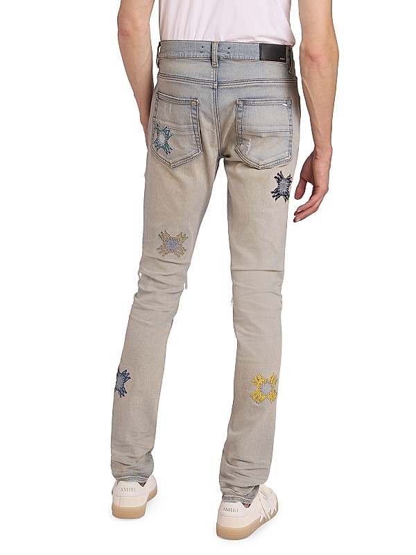 Shop Amiri MA Quad Cut-Out Mx1 Jeans | Saks Fifth Avenue Shop Amiri MA Quad Cut-Out Mx1 Jeans | Saks Fifth Avenue