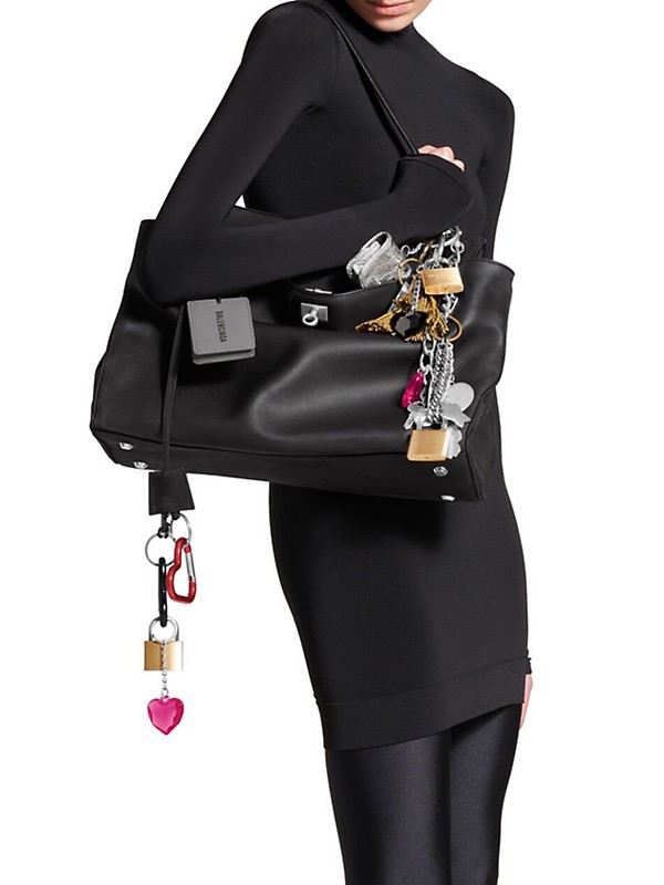 Shop Balenciaga Rodeo Used Effect Large Handbag with Charms Shop Balenciaga Rodeo Used Effect Large Handbag with Charms