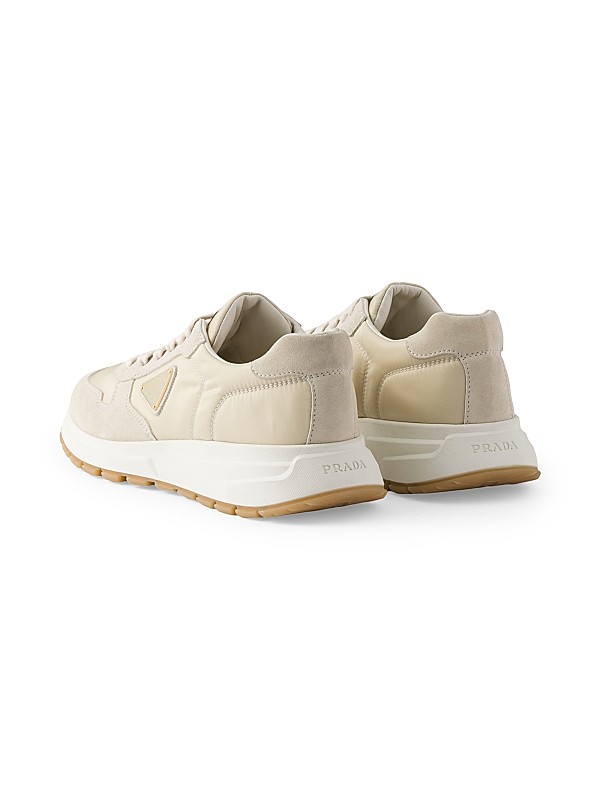 Shop Prada Prax 01 Re-Nylon and Suede Sneakers | Saks Fifth Shop Prada Prax 01 Re-Nylon and Suede Sneakers | Saks Fifth