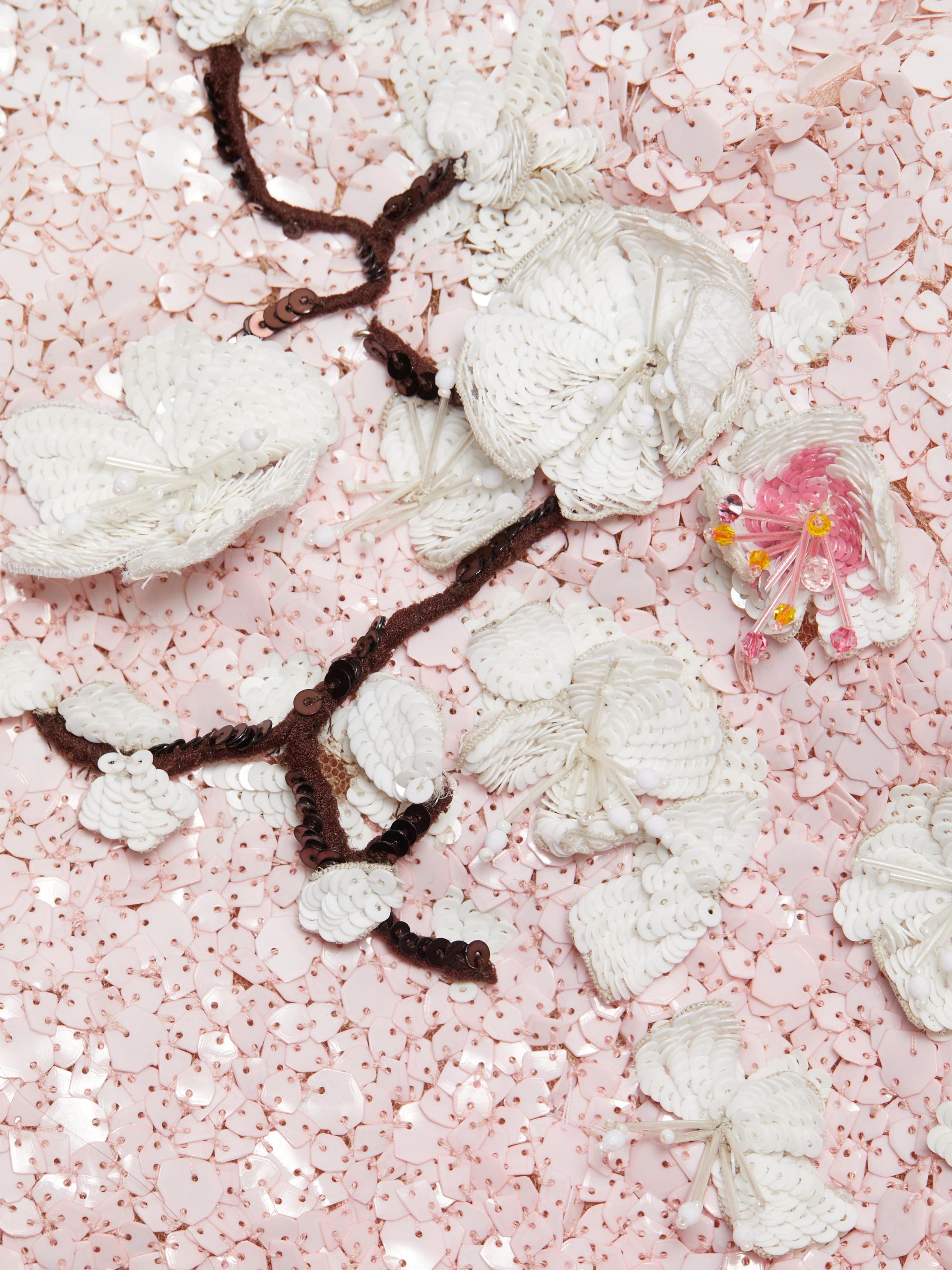 cherry blossom sequin dress ivankatrump wears the #odlrprefall2025 sequin cherry blossom mini.  Thousands of sequins create an ombr mosaic, and statement blossom  embroideries climb the silhouette to accent the neckline. Discover details