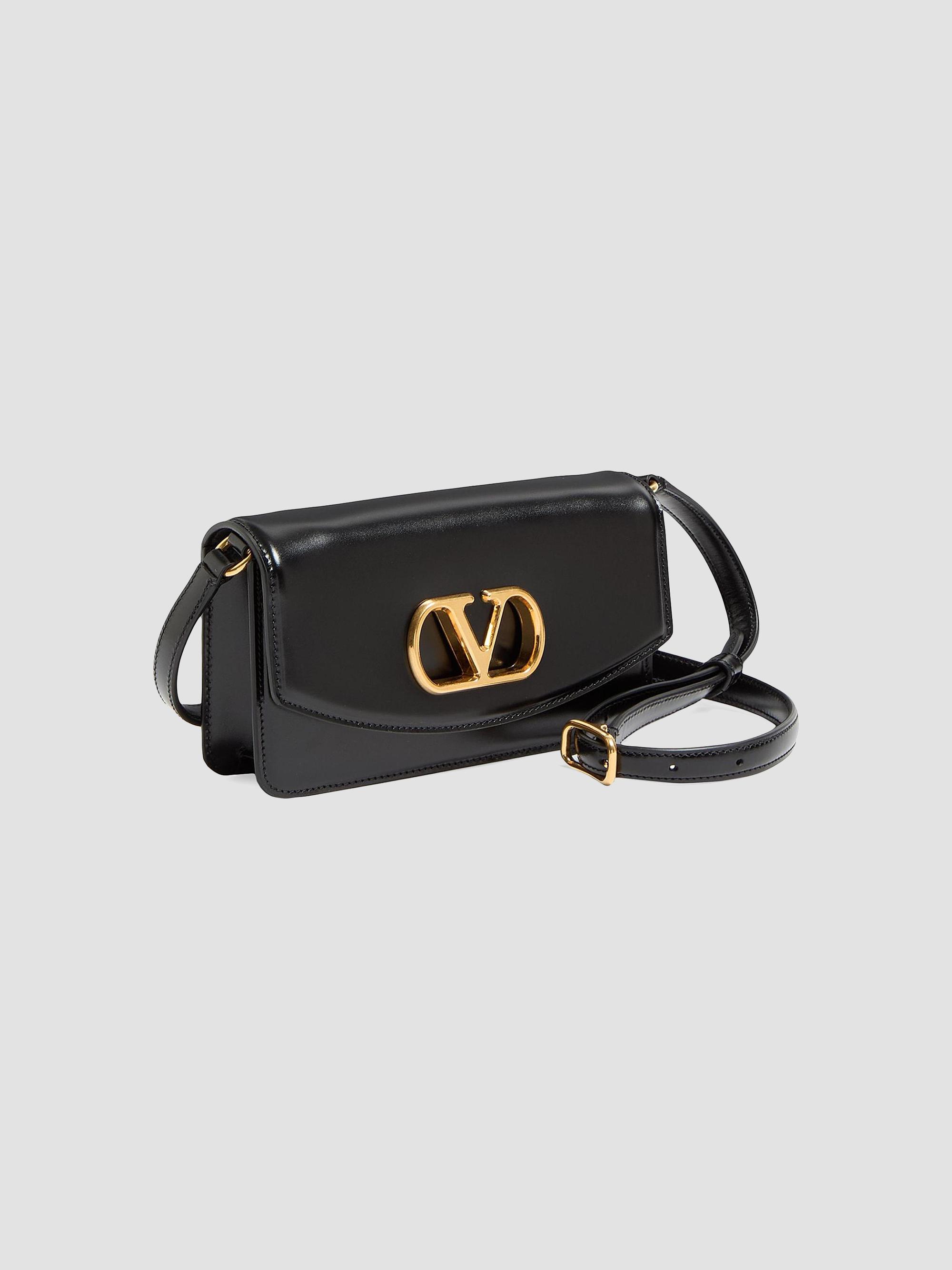 Valentino Garavani Vain Clutch Bag in Shiny Calfskin | Saks Fifth