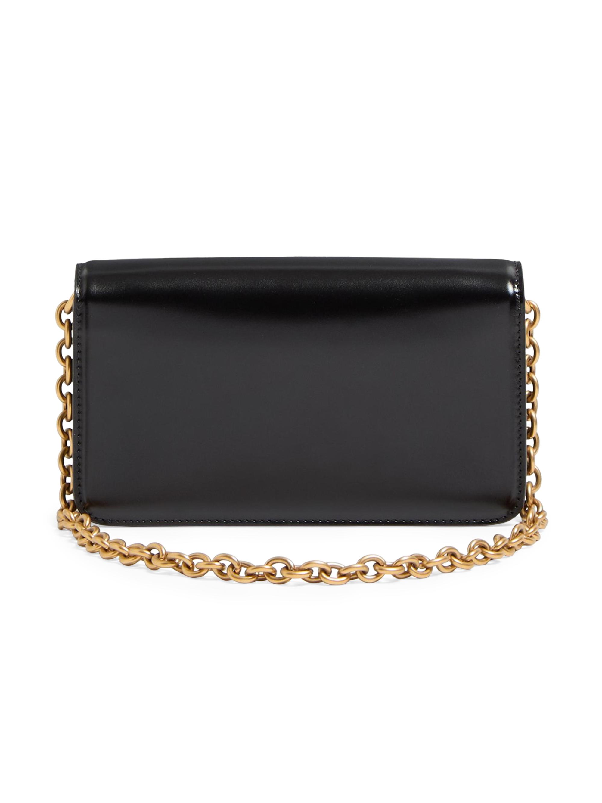 Valentino Garavani Vain Clutch Bag in Shiny Calfskin | Saks Fifth