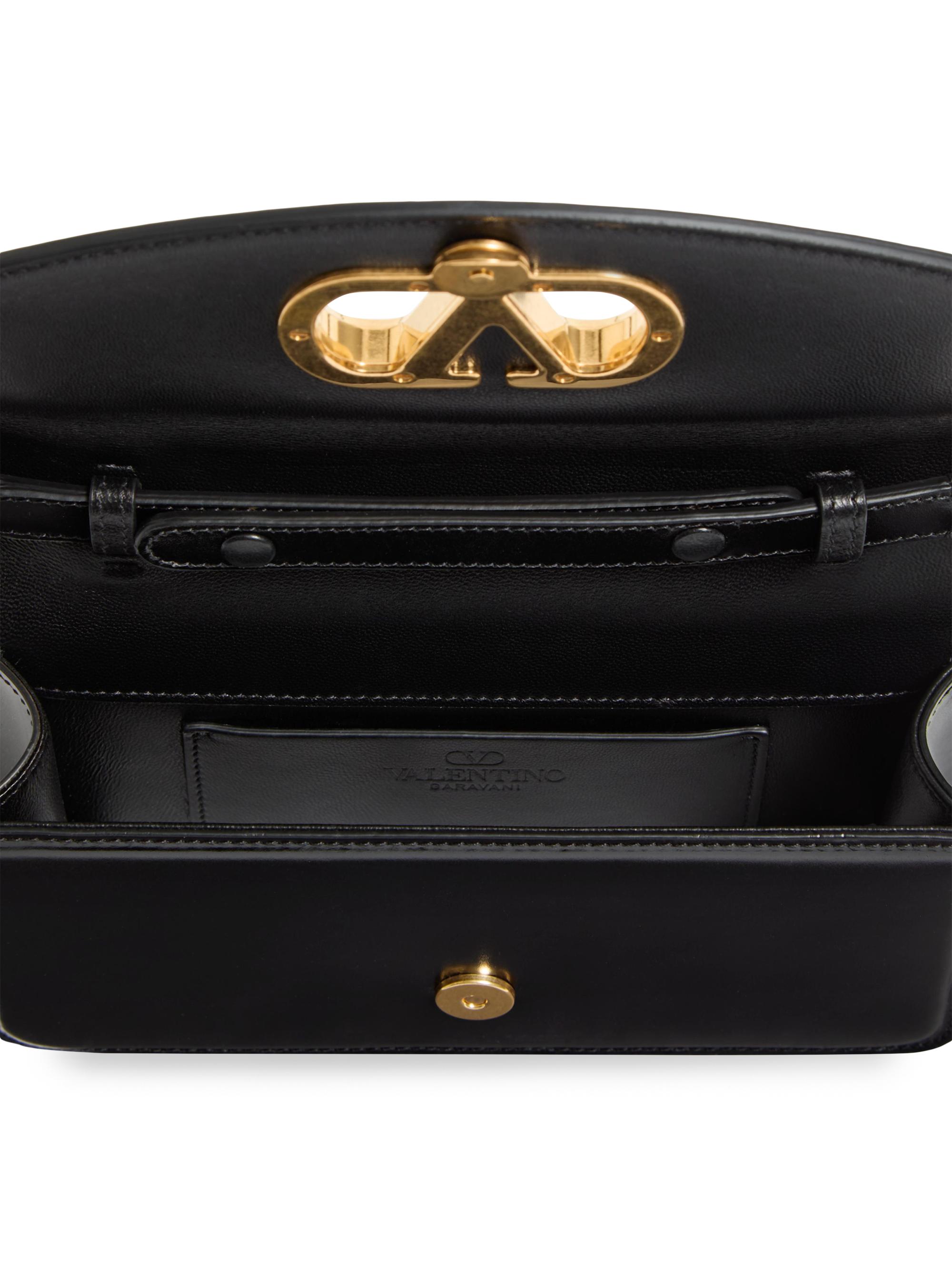 Valentino Garavani Vain Clutch Bag in Shiny Calfskin | Saks Fifth