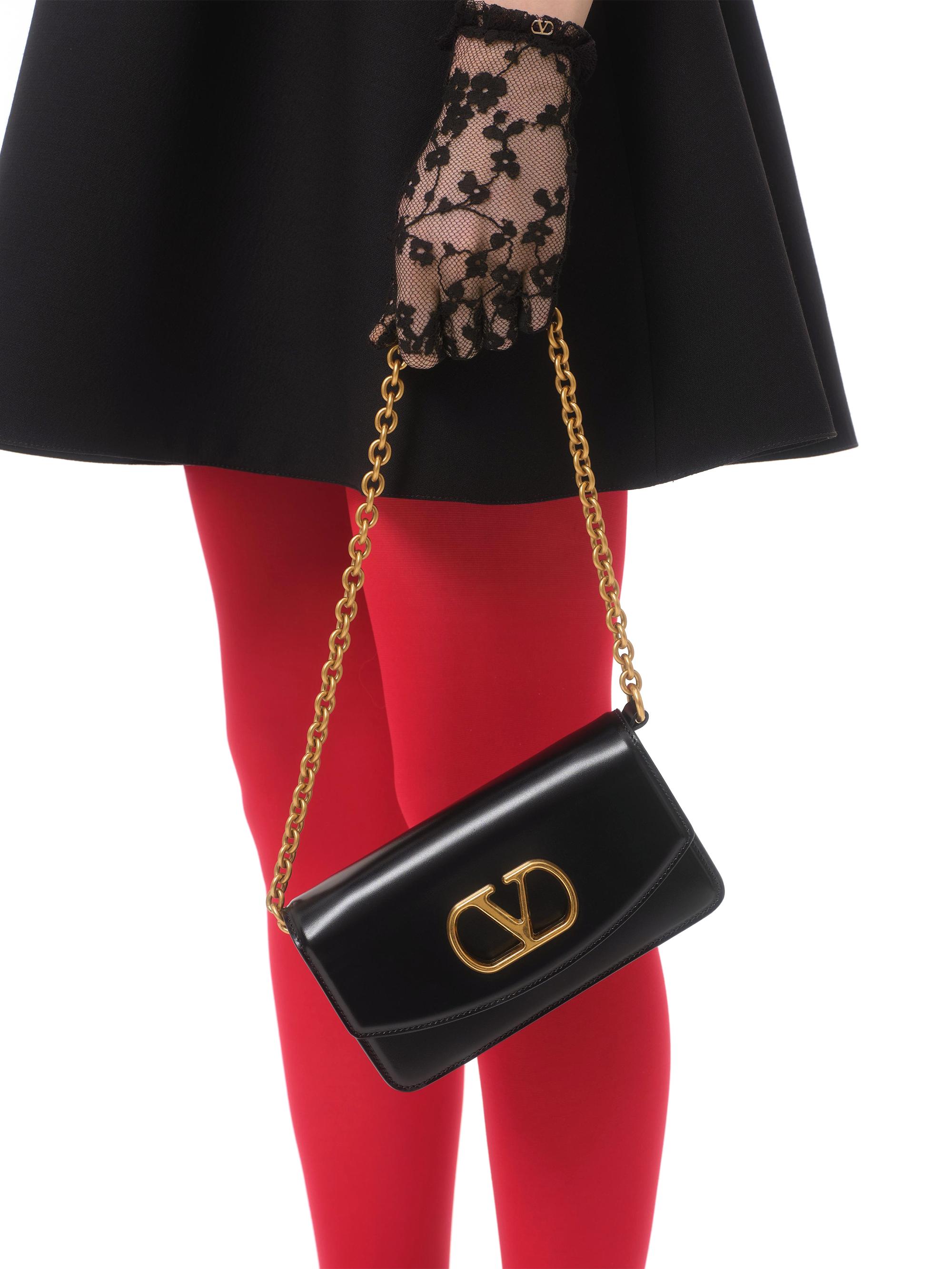 Valentino Garavani Vain Clutch Bag in Shiny Calfskin | Saks Fifth