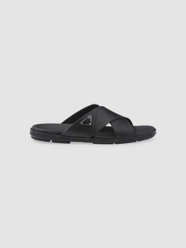 Prada leather crisscross slides in black