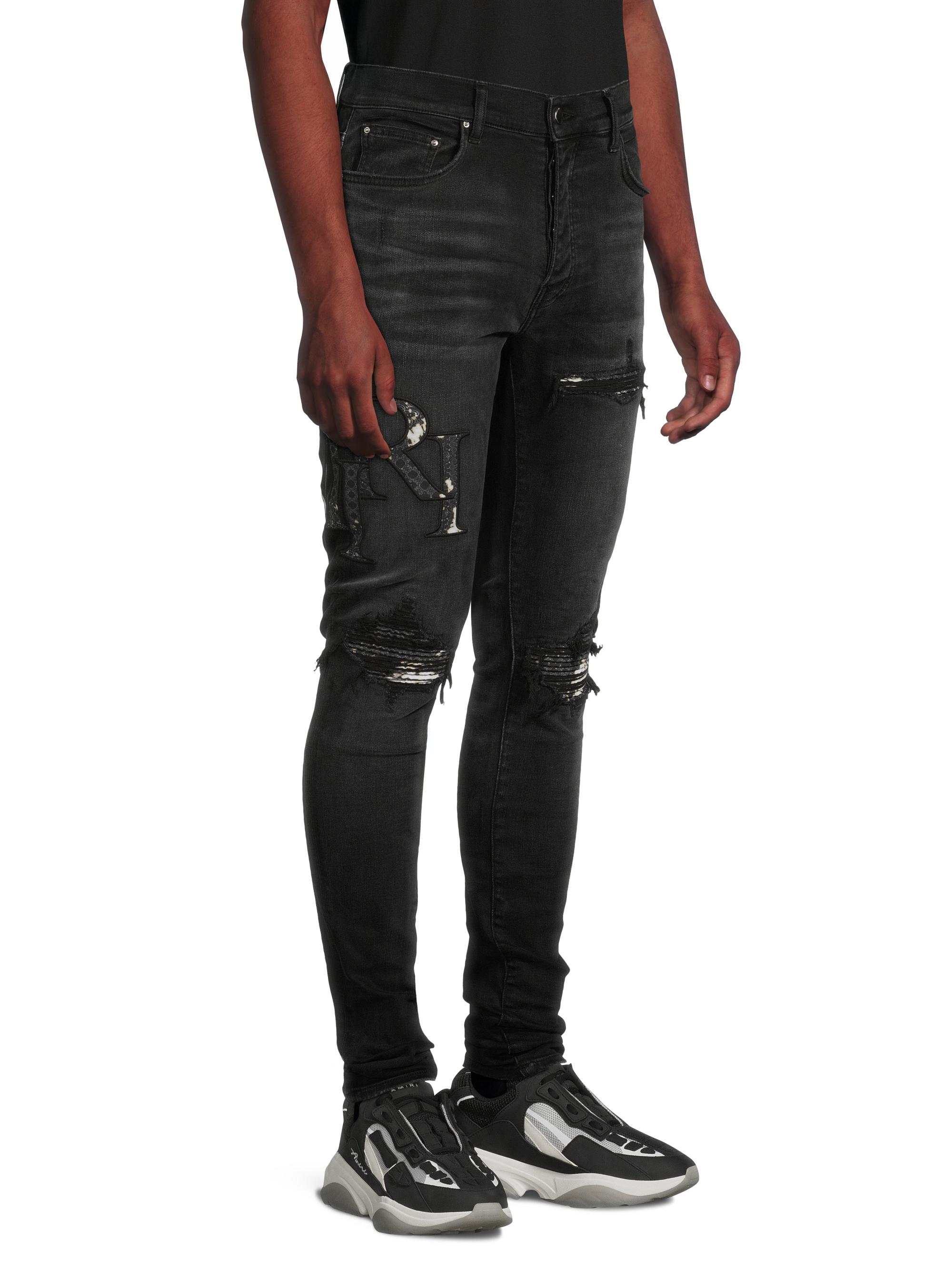Staggered Logo Skinny Jeans