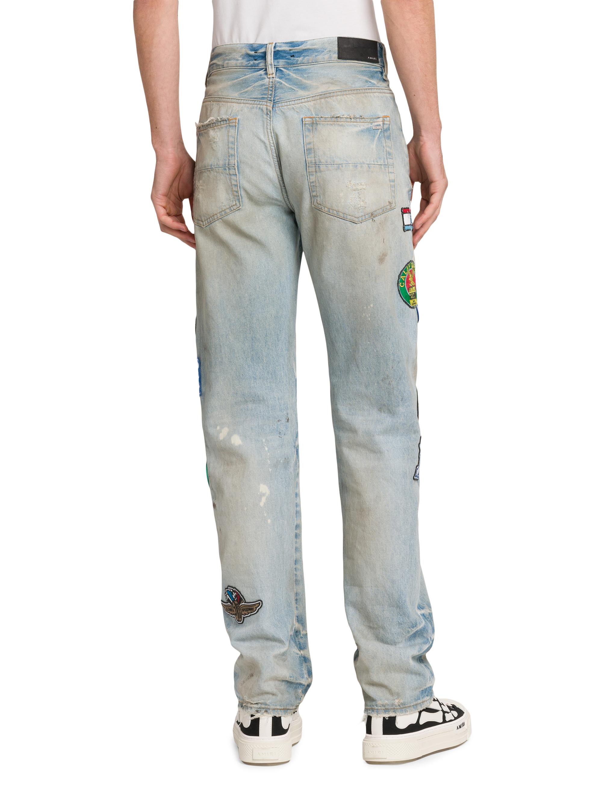 Amiri Thrasher Repair Distressed Patch Slim-Fit Jeans | Saks Fifth