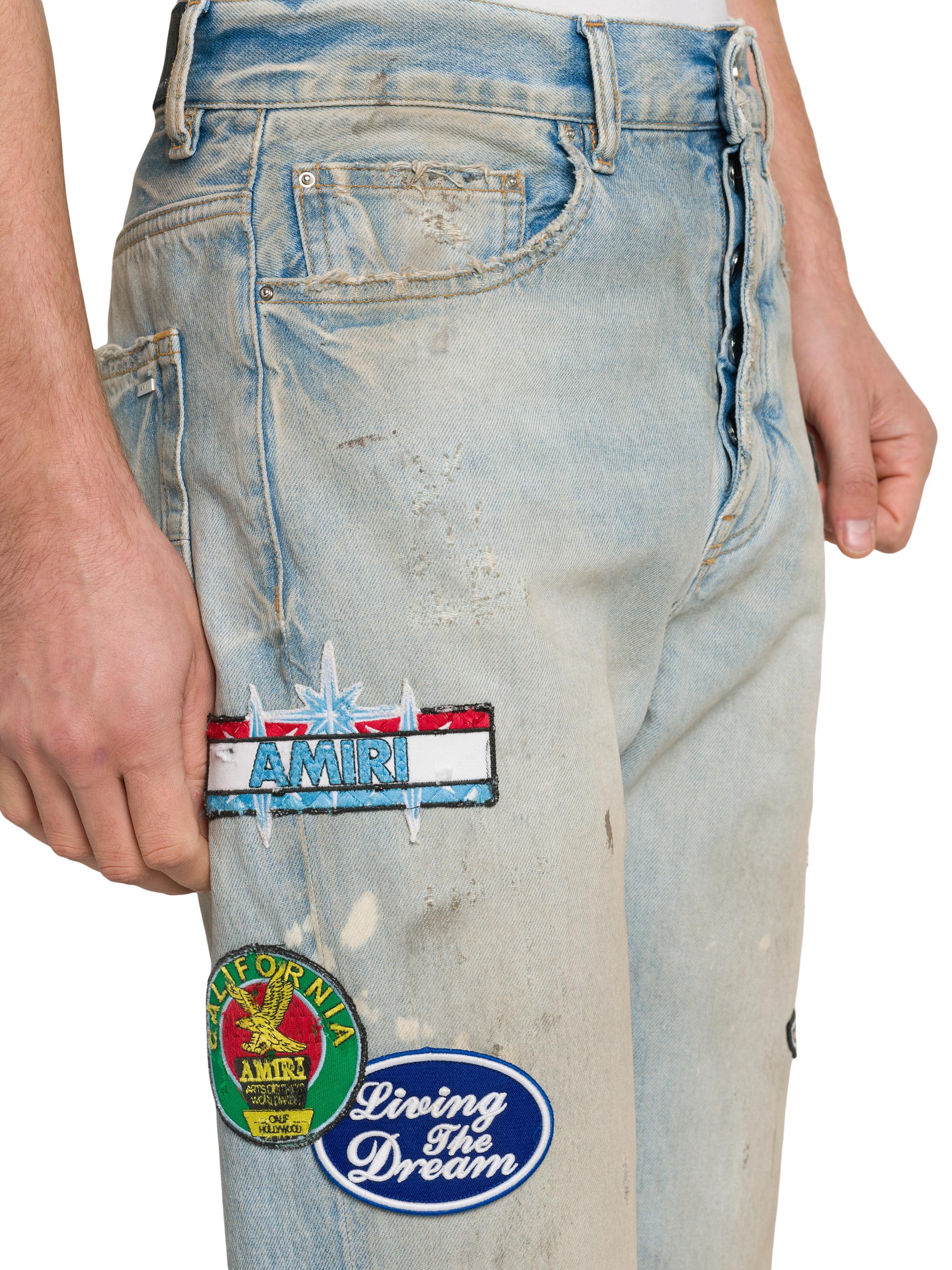 Amiri Thrasher Repair Distressed Patch Slim-Fit Jeans | Saks Fifth