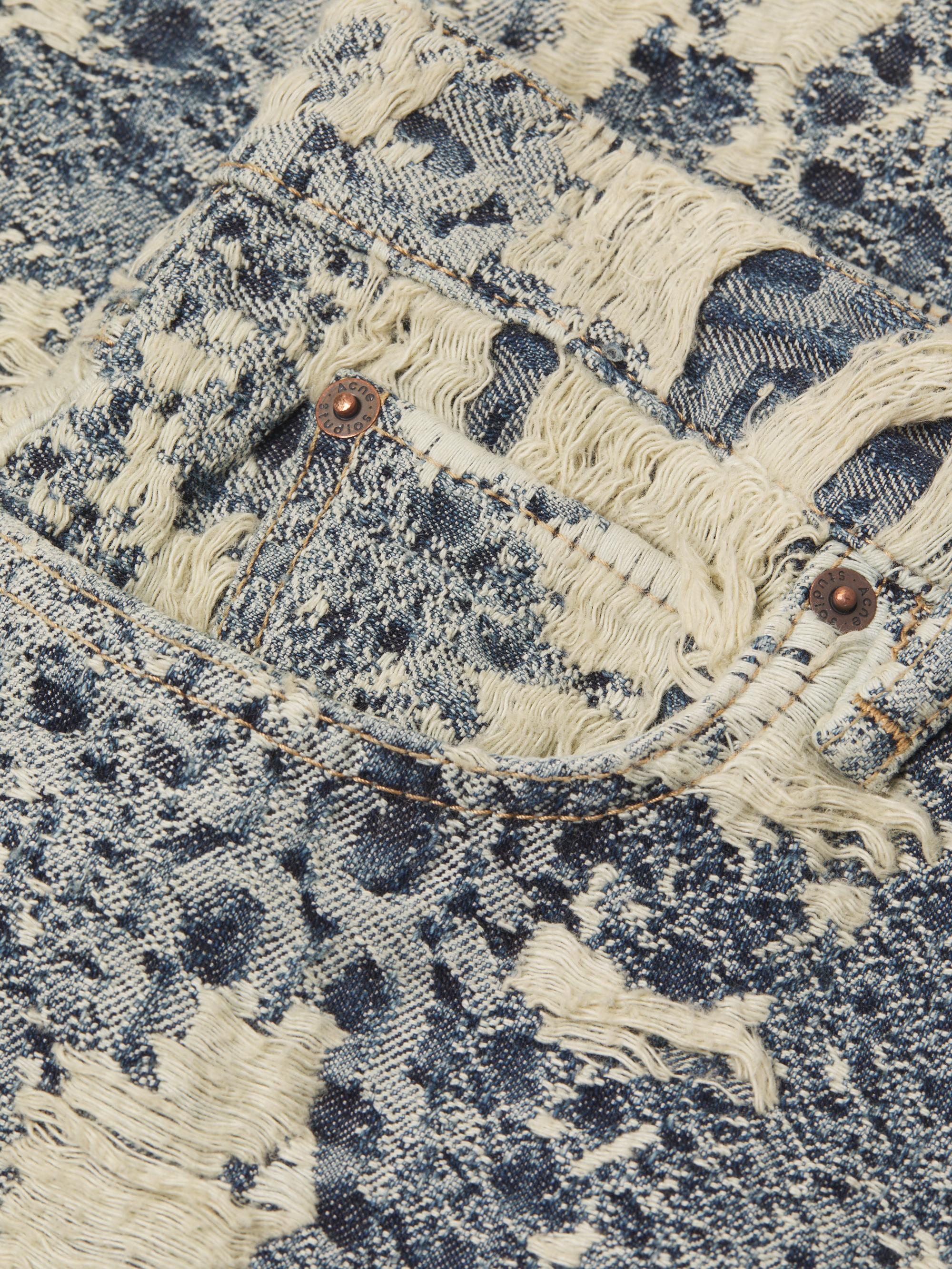 Acne Studios 1981 Distressed Monogram Jeans | Saks Fifth Avenue