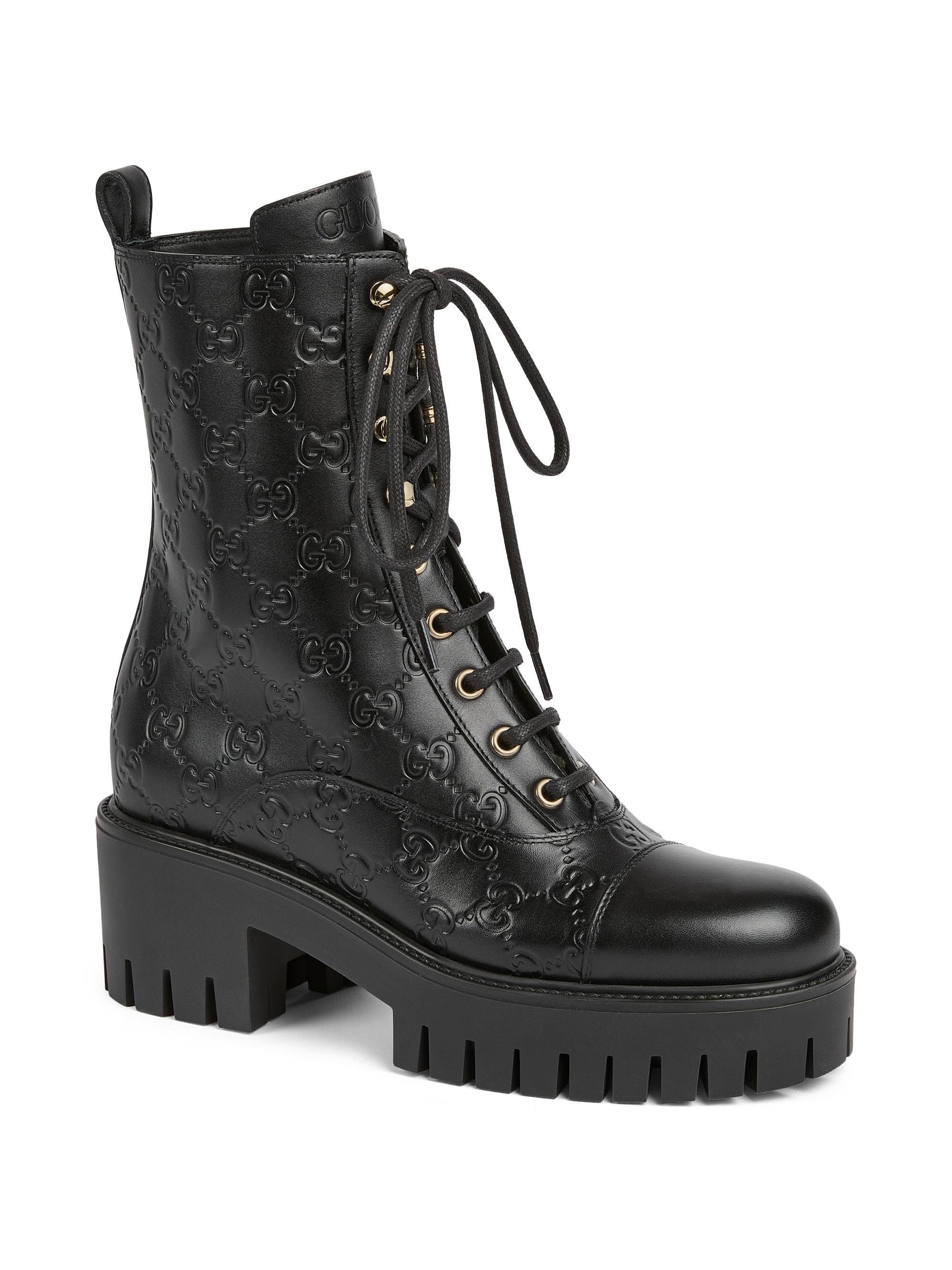 Gucci Embossed Logo Leather Combat Boots | Saks Fifth Avenue