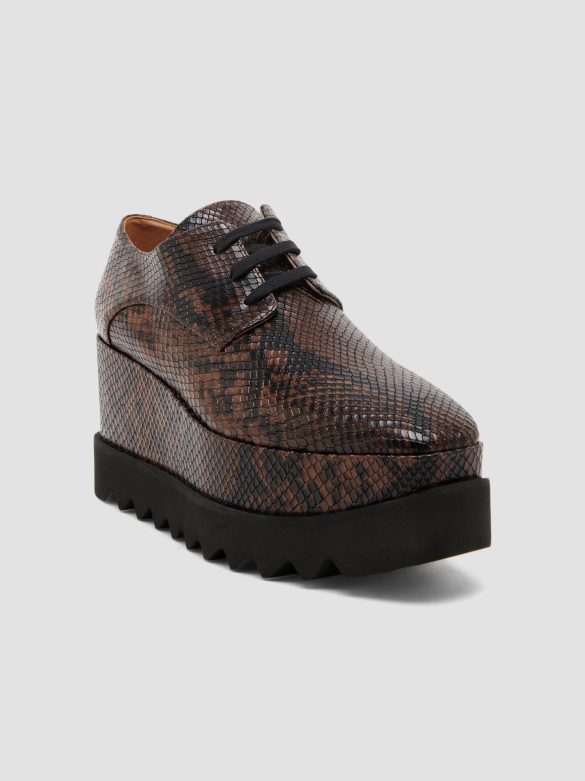 Stella McCartney Elyse Snakeskin-Printed Platform Sneakers | Saks