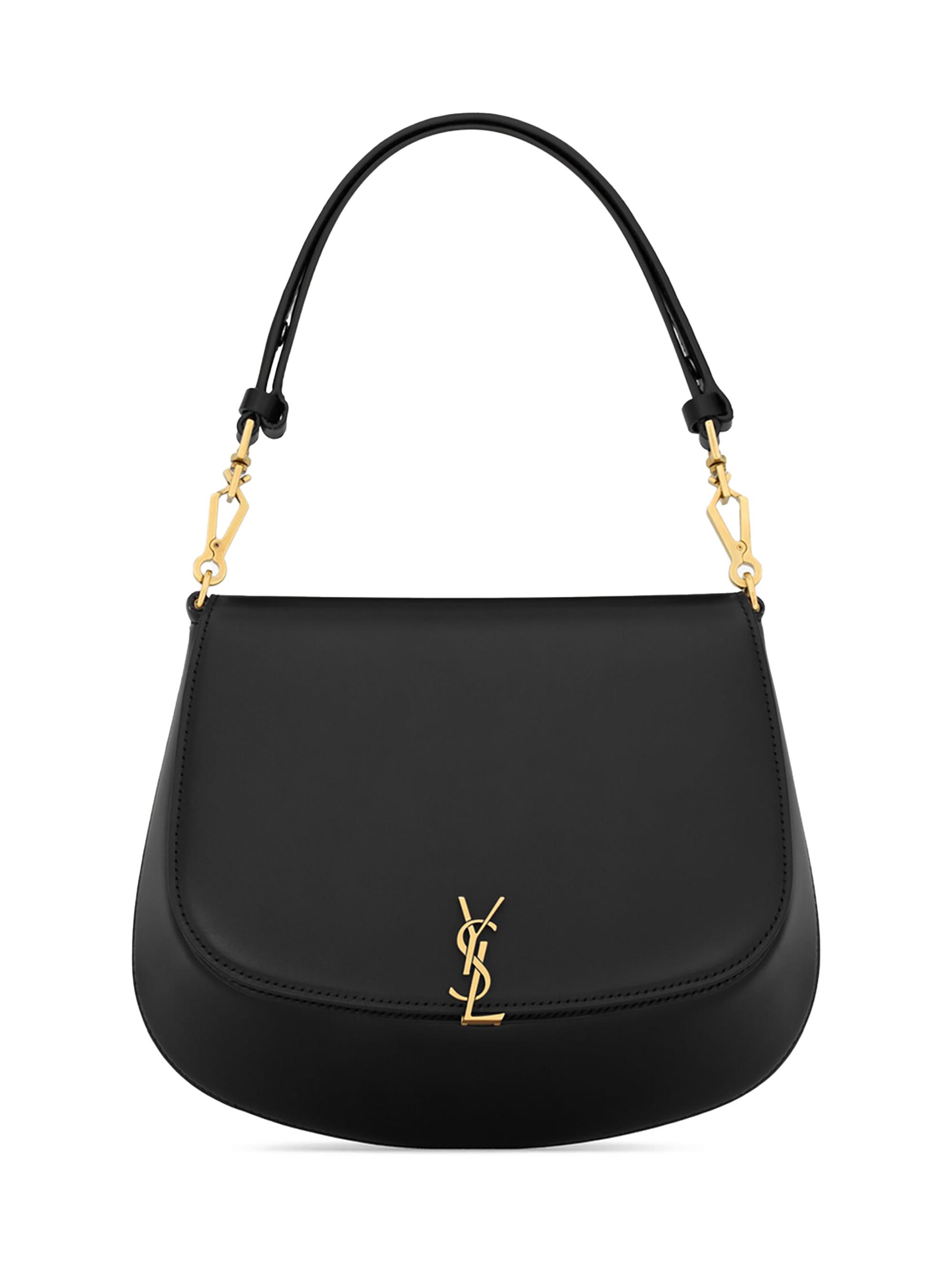 SAINT LAURENT ブラックレザー ボストンバッグ 上品で知的なスタイルきわだつ「サンローラン」のボストンバッグ | Web