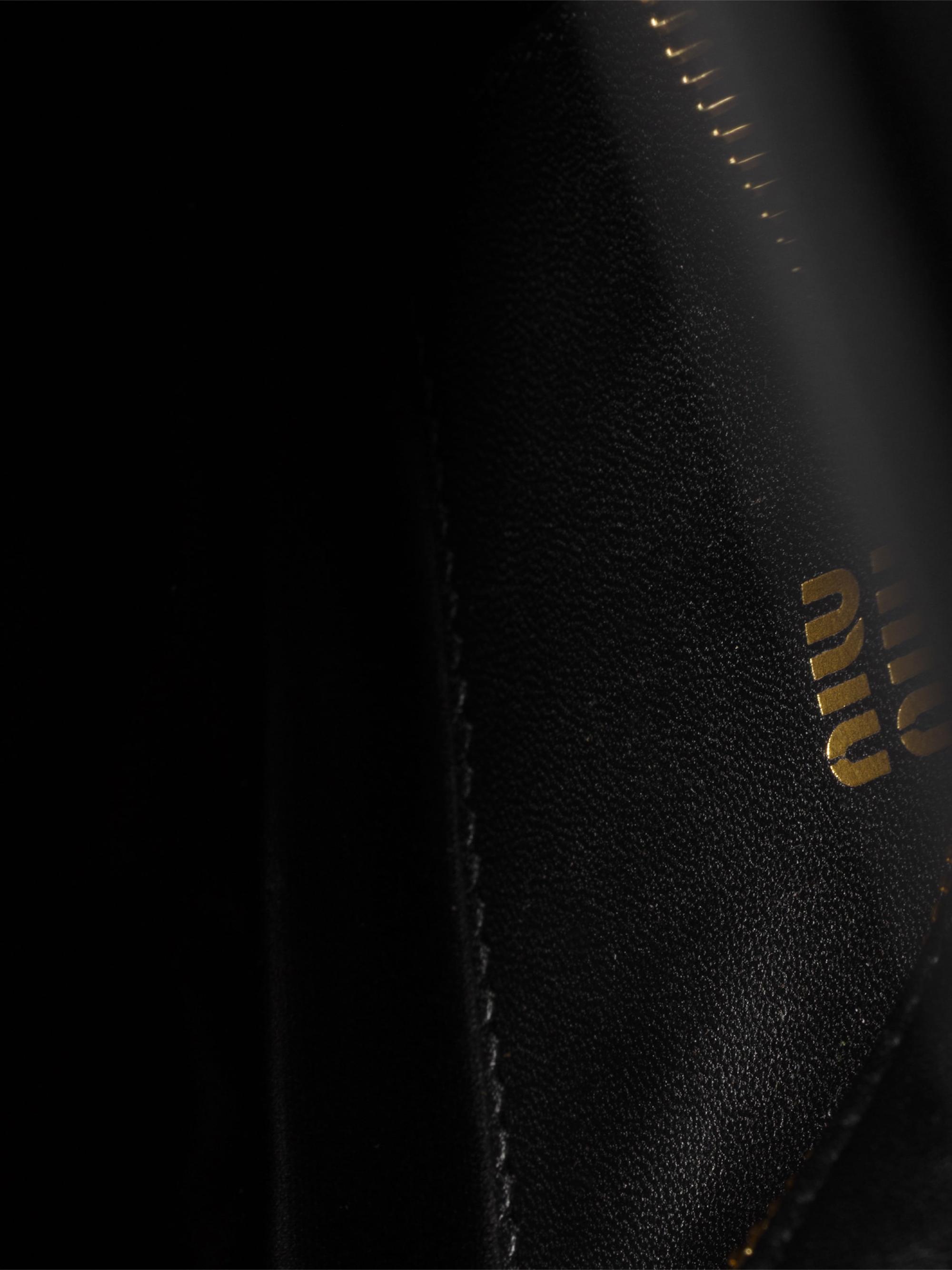 ミュウミュウ　Nappa leather pouch ブラック Miu Miu Matelassé Nappa Leather Pouch | Saks Fifth Avenue