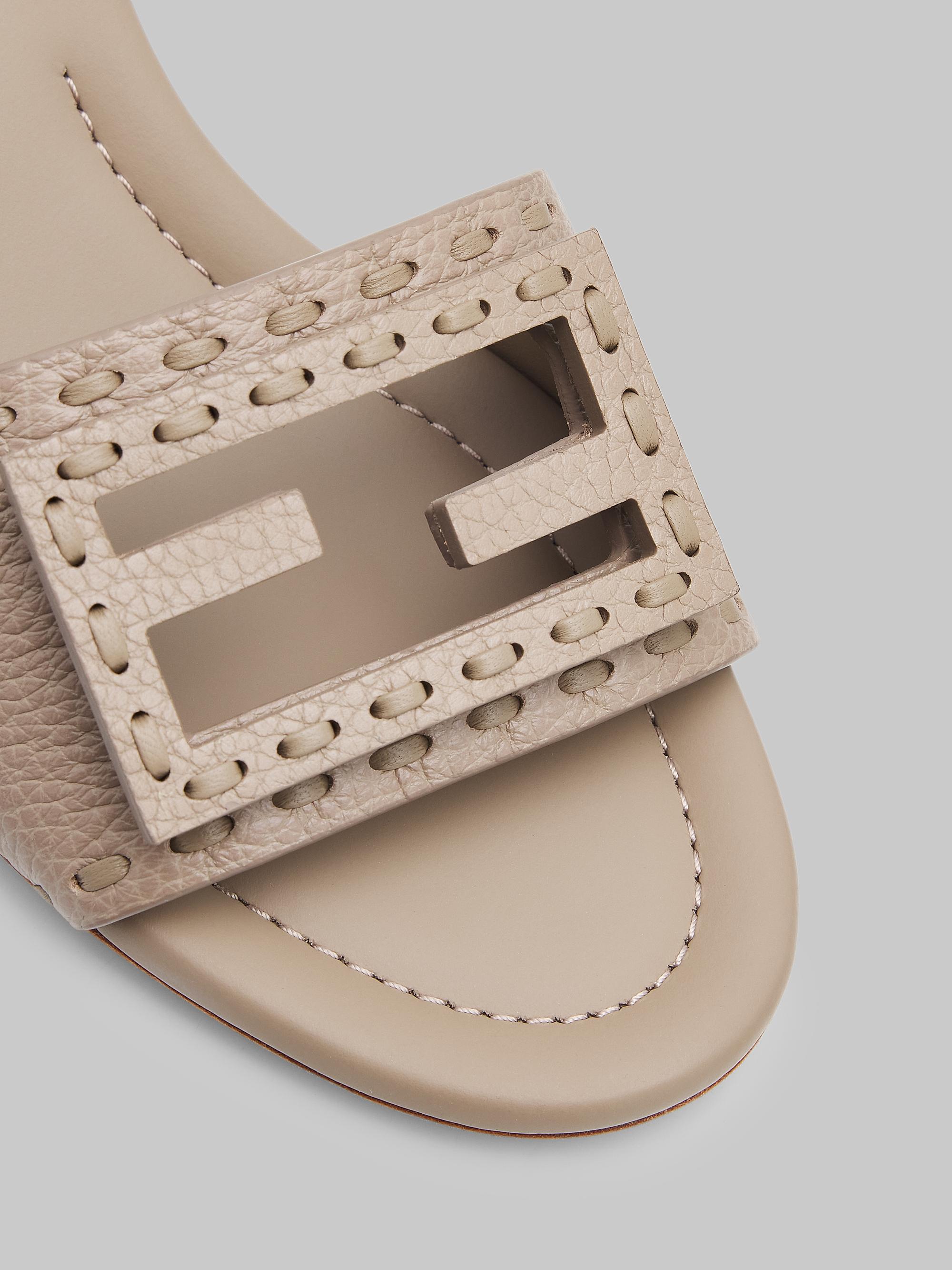 Fendi Vitello 45MM Logo Leather Mules | Saks Fifth Avenue