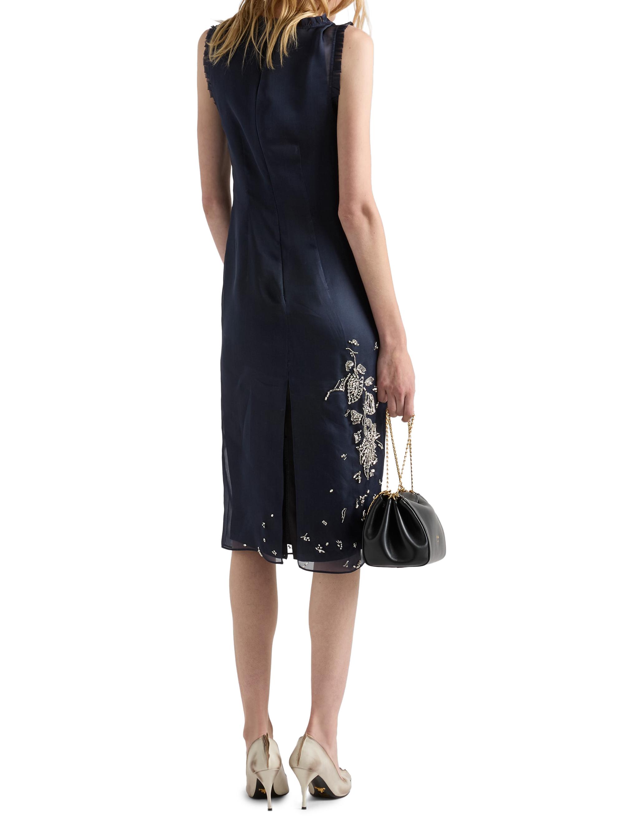 prada organza dress At Prada Spring/Summer 2024, cinched waists and organza trains held  attention