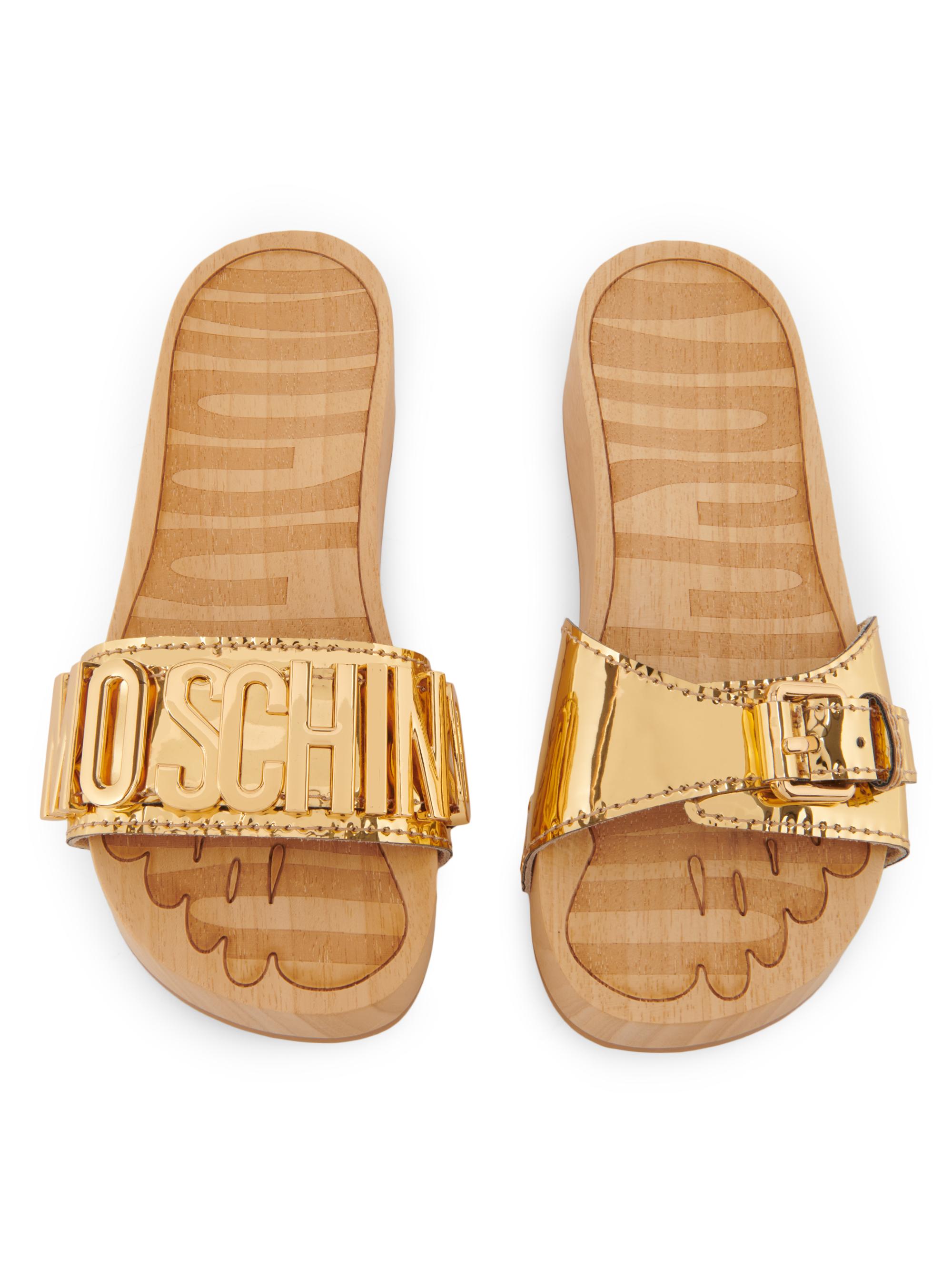 Moschino 45MM Logo & Buckle Chrome Mule Slides | Saks Fifth Avenue