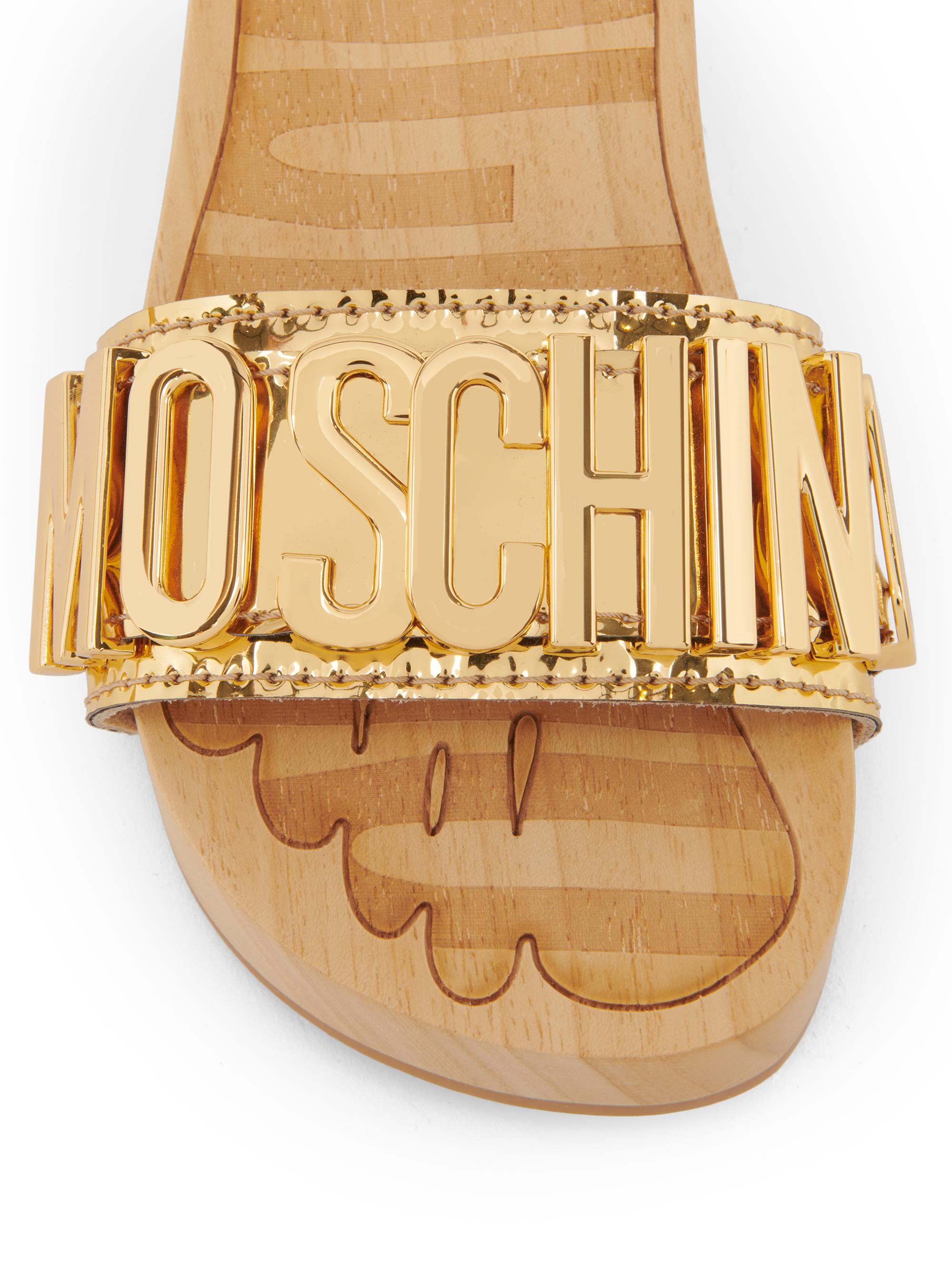 Moschino 45MM Logo & Buckle Chrome Mule Slides | Saks Fifth Avenue