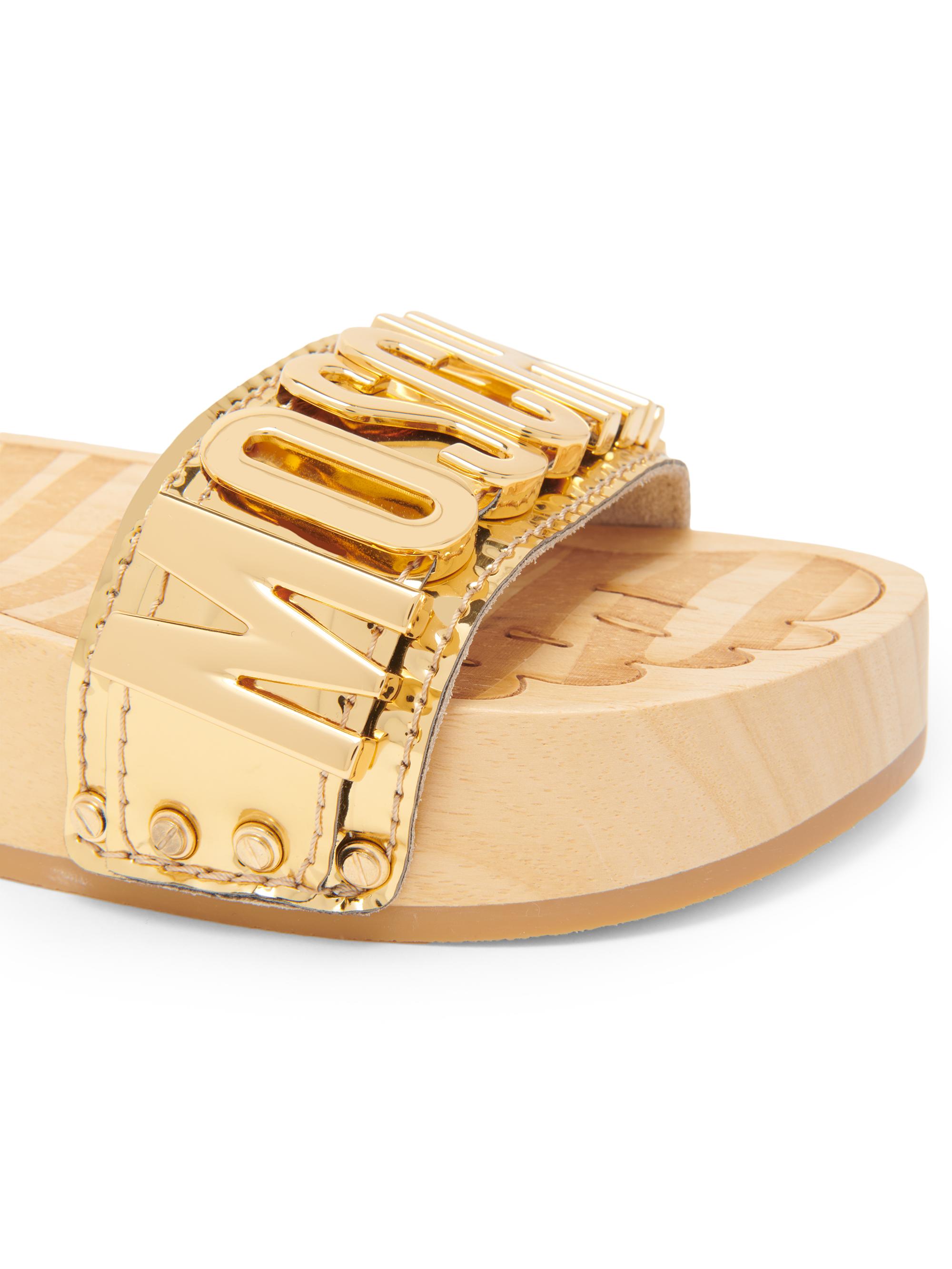 Moschino 45MM Logo & Buckle Chrome Mule Slides | Saks Fifth Avenue