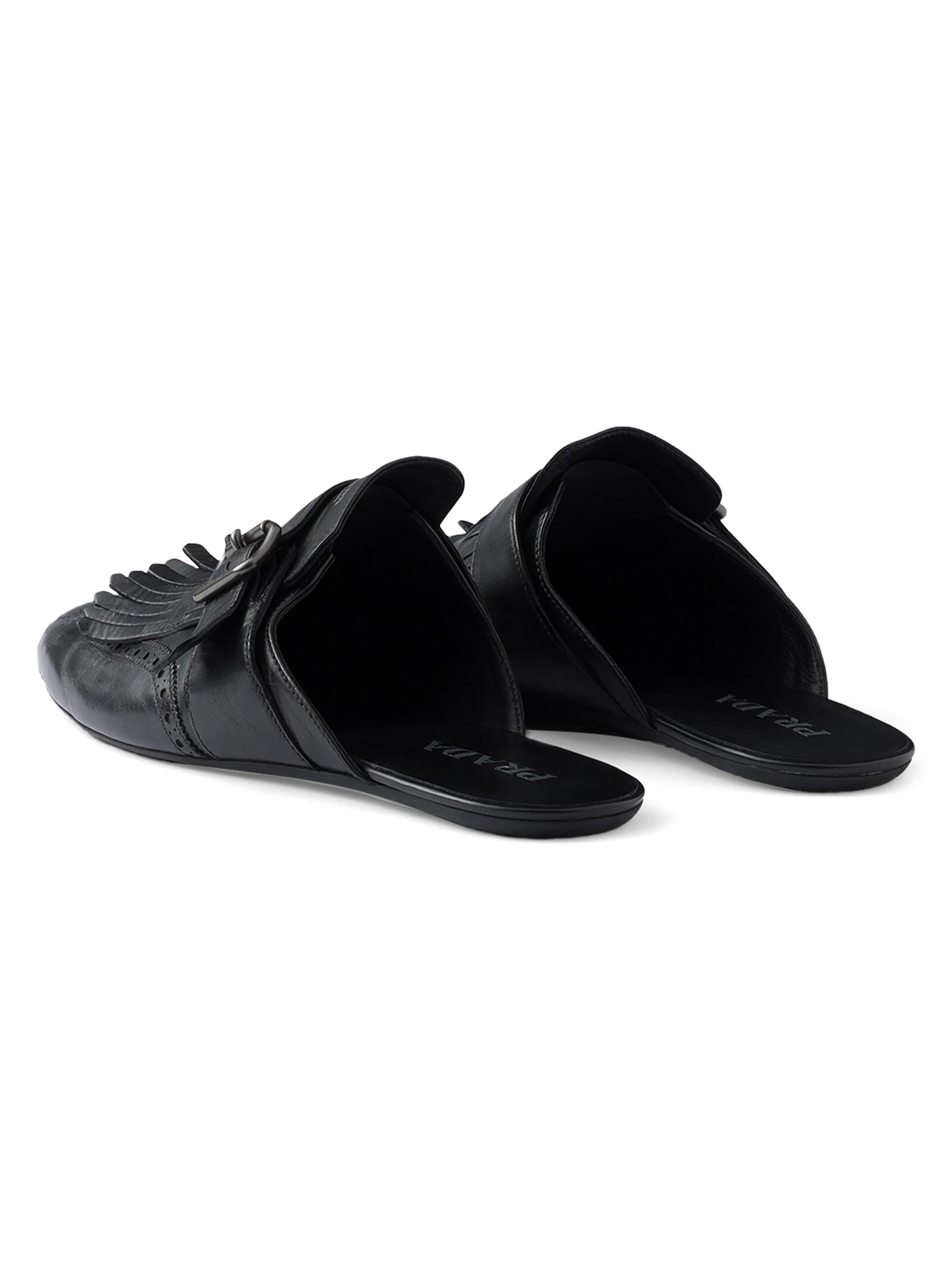Prada Shuffle Antiqued Leather Mules with Buckled Strap and Fringe
