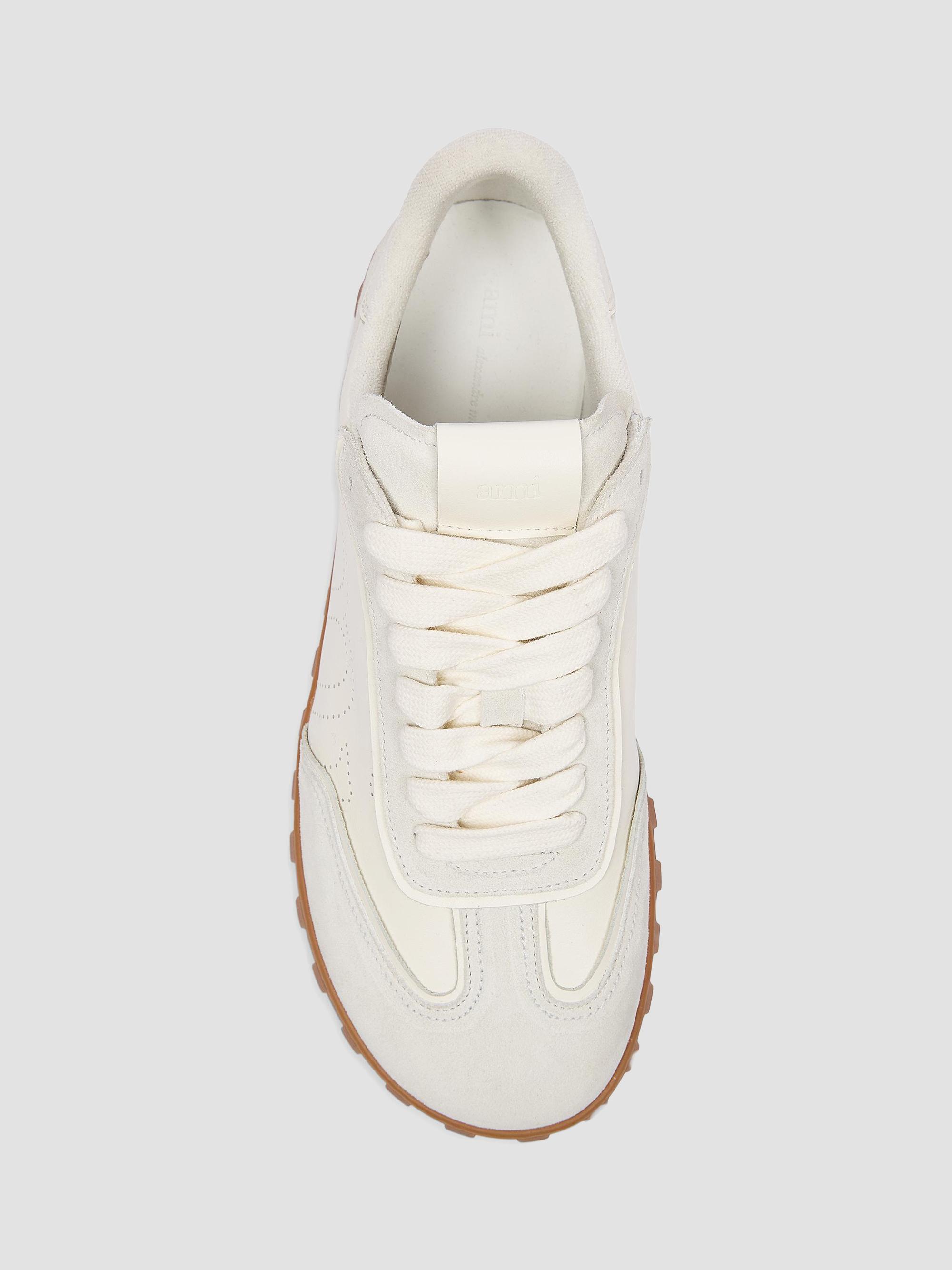 amiページ AMI Paris Step Leather Low-Top Sneakers | Saks Fifth Avenue