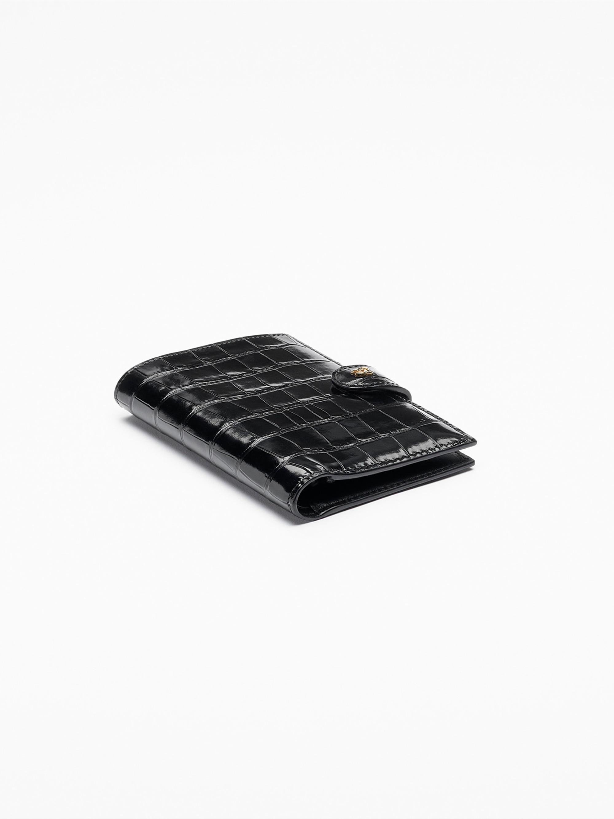 CHANEL PASSPORT HOLDER | Saks Fifth Avenue