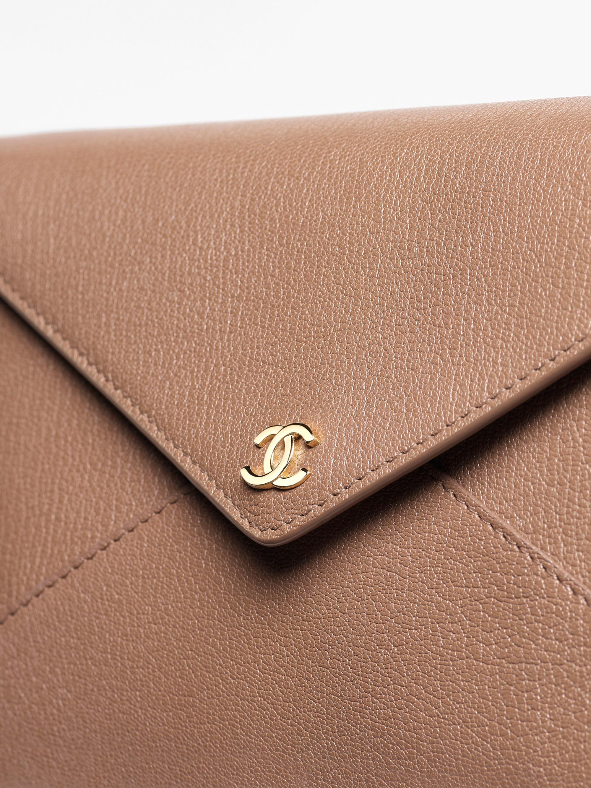 CHANEL CLUTCH WITH LEATHER STRAP | Saks Fifth Avenue