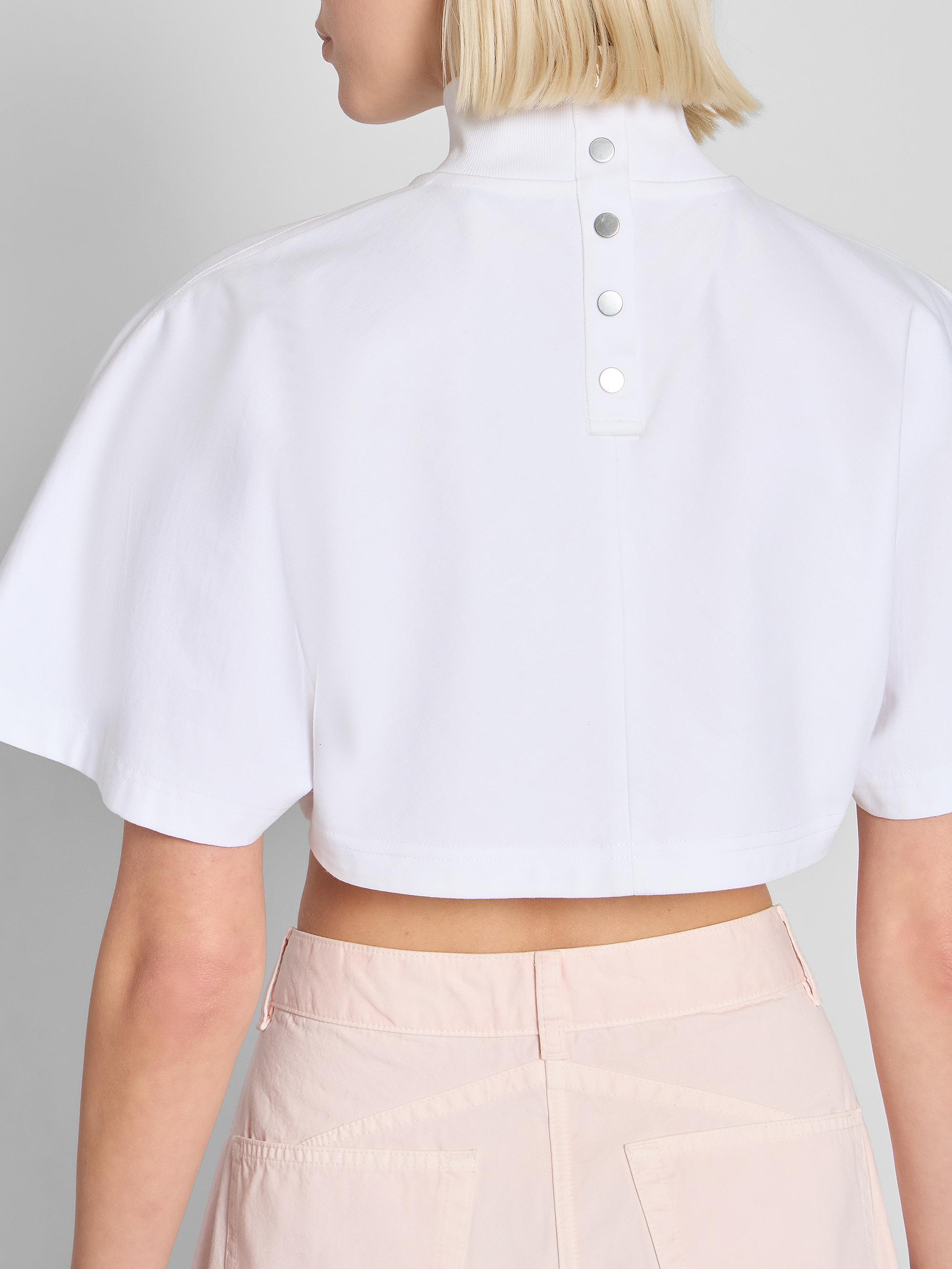 ALAÏA Turtleneck Cotton Jersey Crop T-Shirt | Saks Fifth Avenue