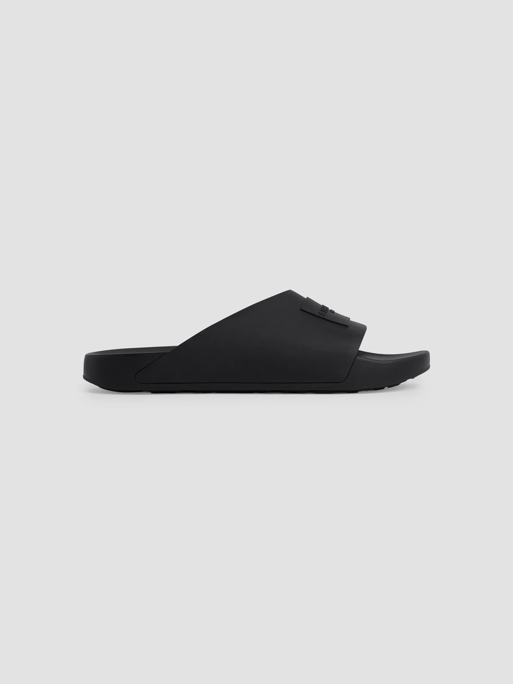 Givenchy Label Slide Flat Mules in Rubber | Saks Fifth Avenue
