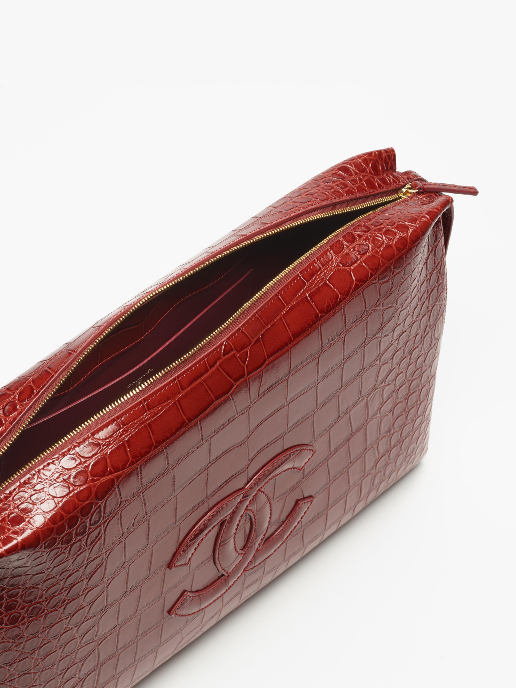 CHANEL LARGE ZIPPED POUCH | Saks Fifth Avenue