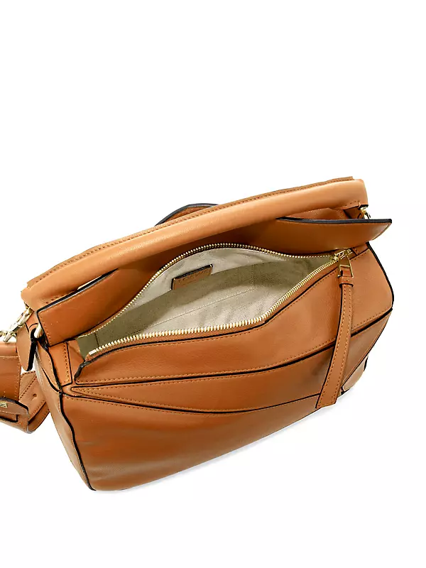 Why are prada handbags very expensive? - Quora