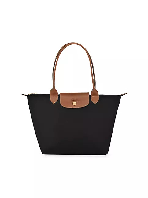 Comparison and What fits in the Longchamp Bucket bag and extra small Le  Pliage tote! 