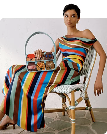 https://cdn.saksfifthavenue.com/is/image/saks/051325_WA_CLOTHING_TOPNAV_TOUT?scl=1&qlt=85